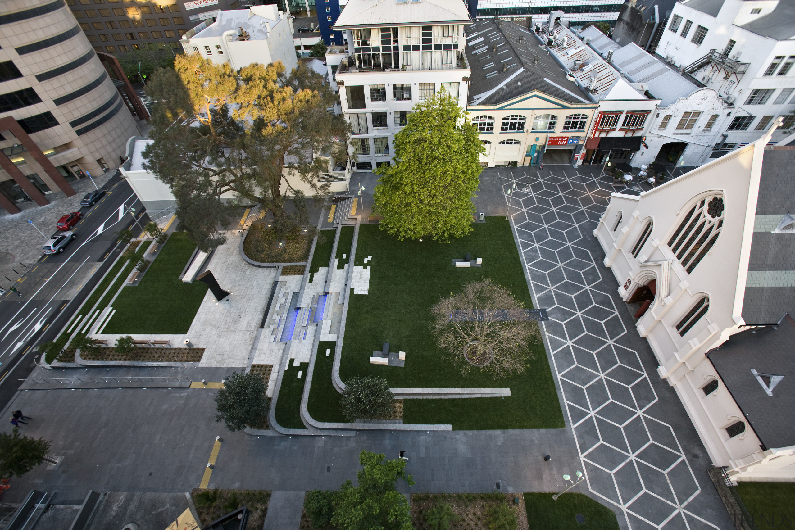 View of St Patrick's square featuring landscaping, paving, aerial photography, architecture, bird's eye view, building, city, condominium, house, metropolitan area, mixed use, neighbourhood, residential area, suburb, tree, urban area, urban design, gray