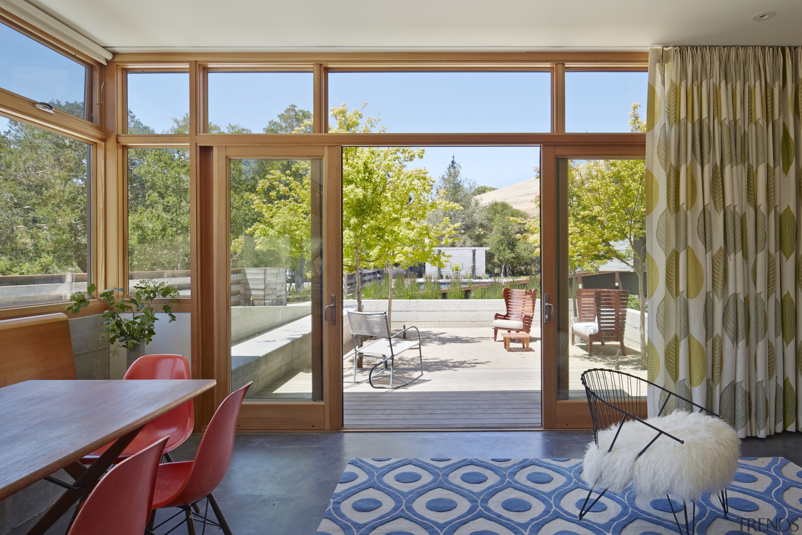 Indoor outdoor living in contemporary rural home - architecture, door, estate, home, house, interior design, living room, property, real estate, window, wood, gray, brown
