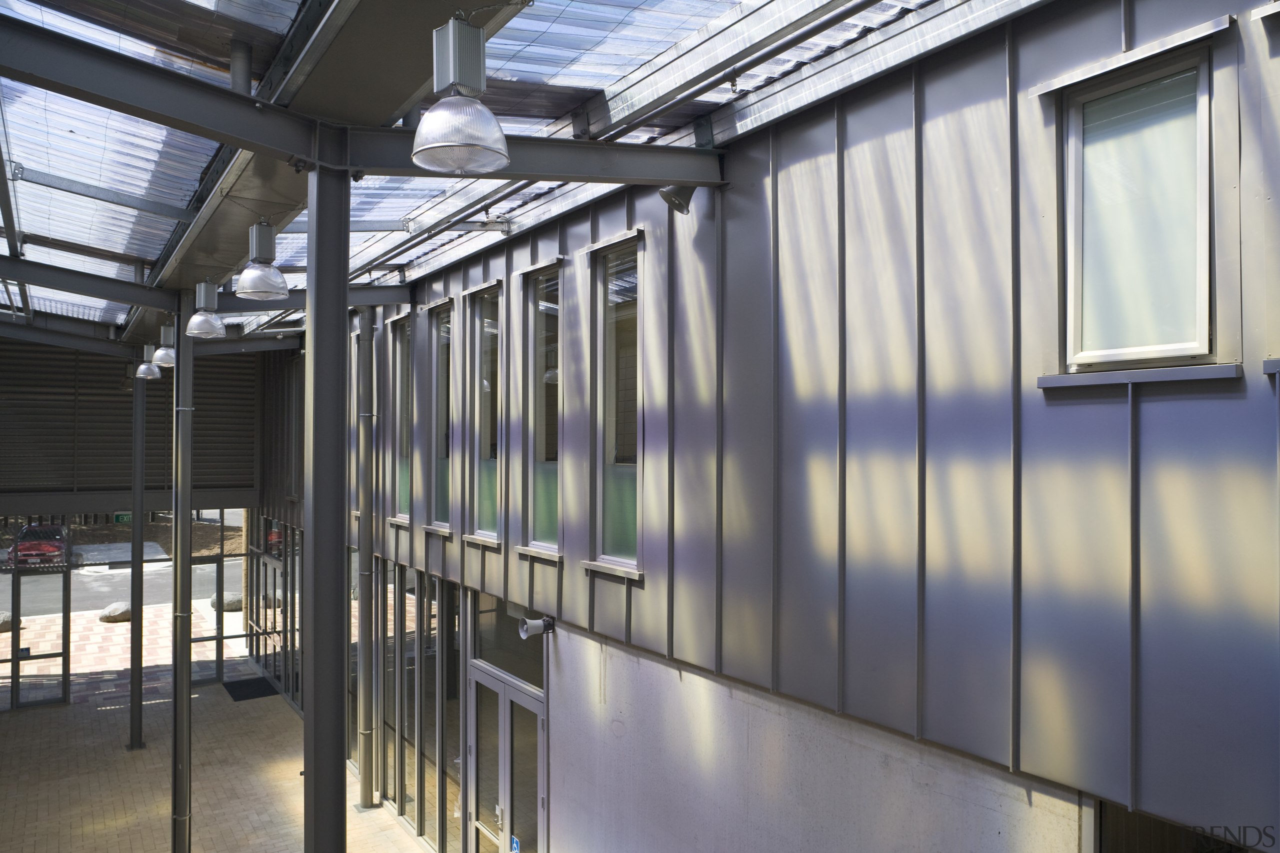 Exterior view of school which features cladding manufactured architecture, daylighting, structure, gray, black