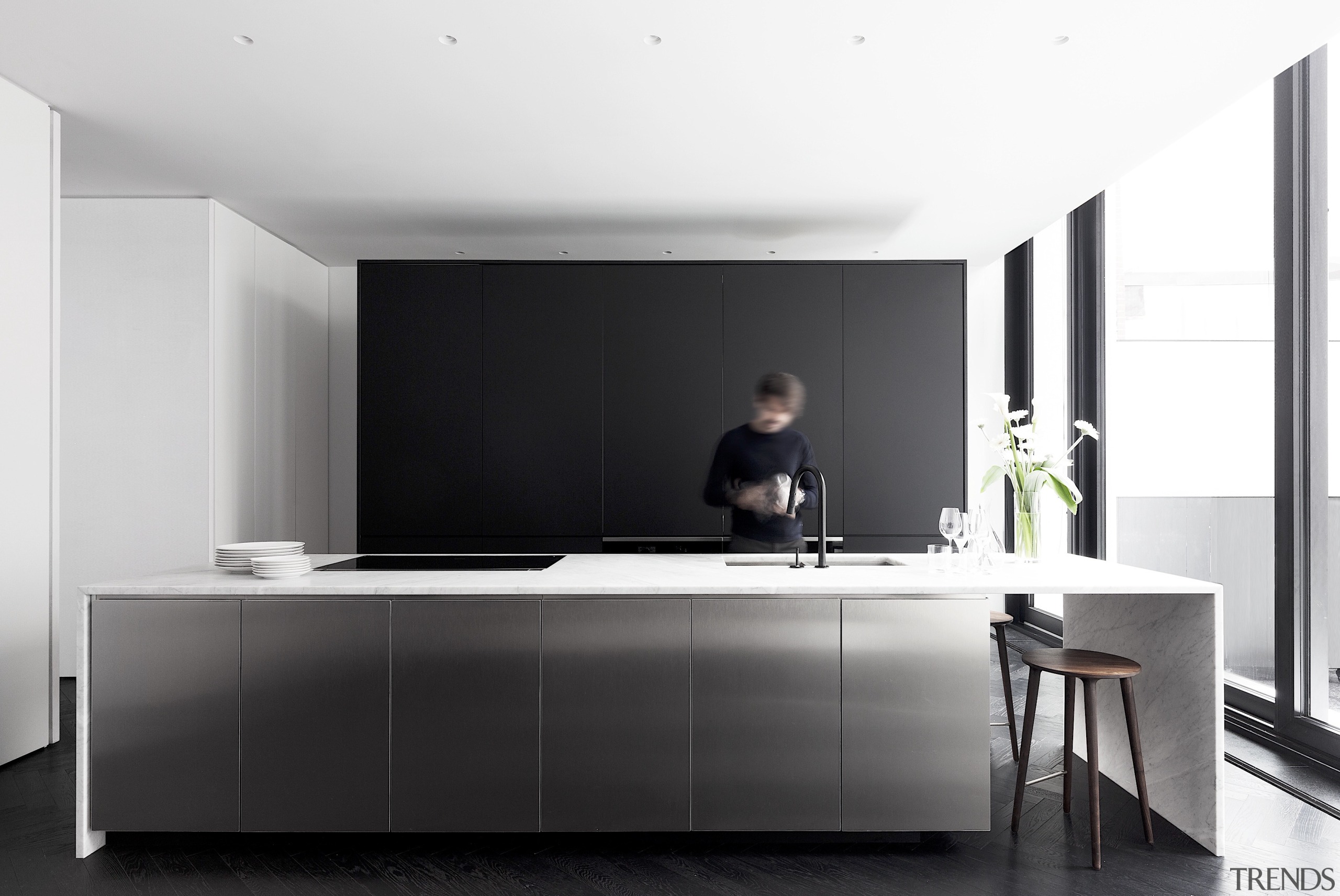 The kitchen is as pared back and minimalist 