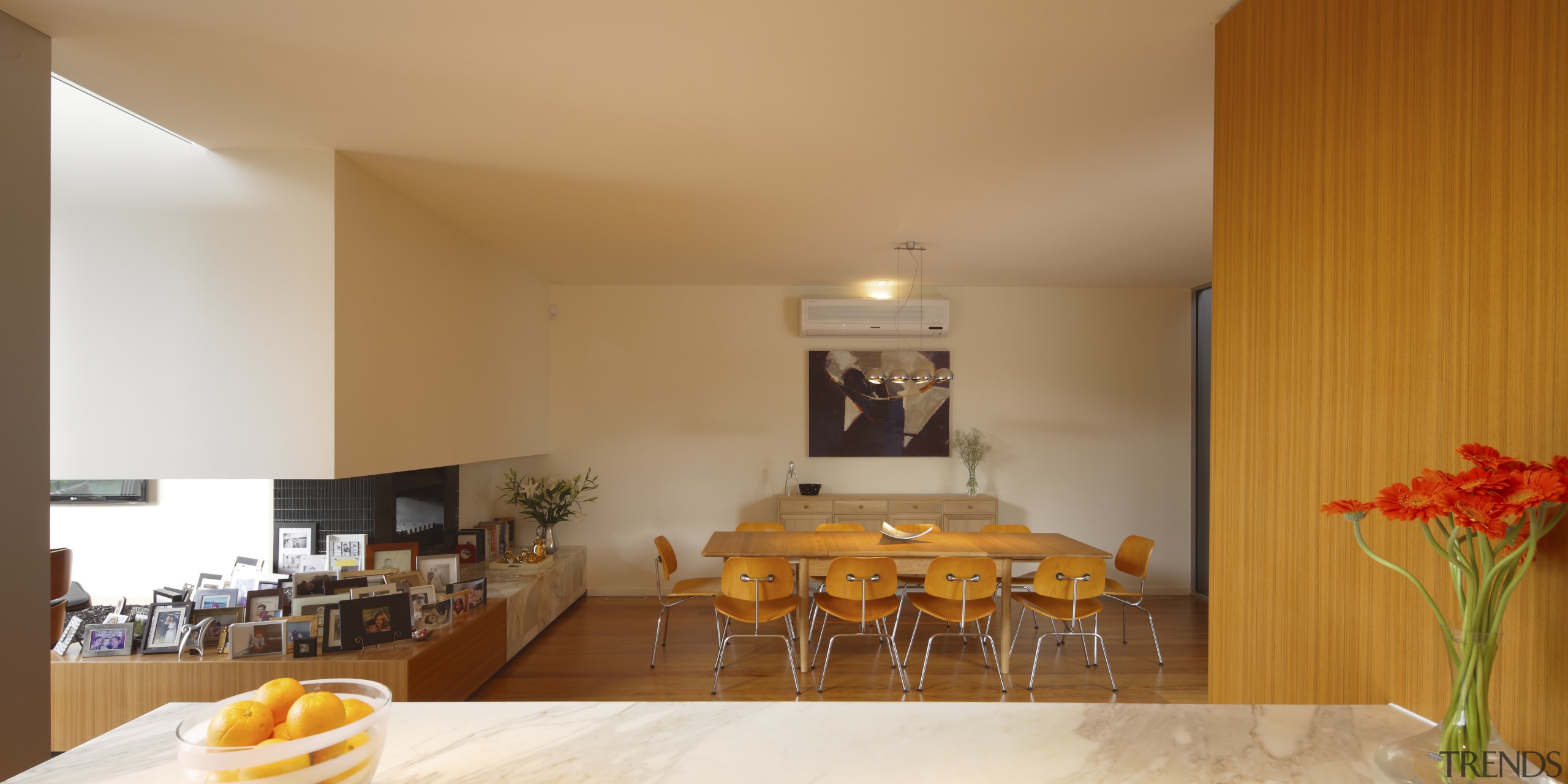 View of dining area with wooden table and apartment, architecture, ceiling, dining room, home, interior design, living room, real estate, room, suite, table, orange, brown