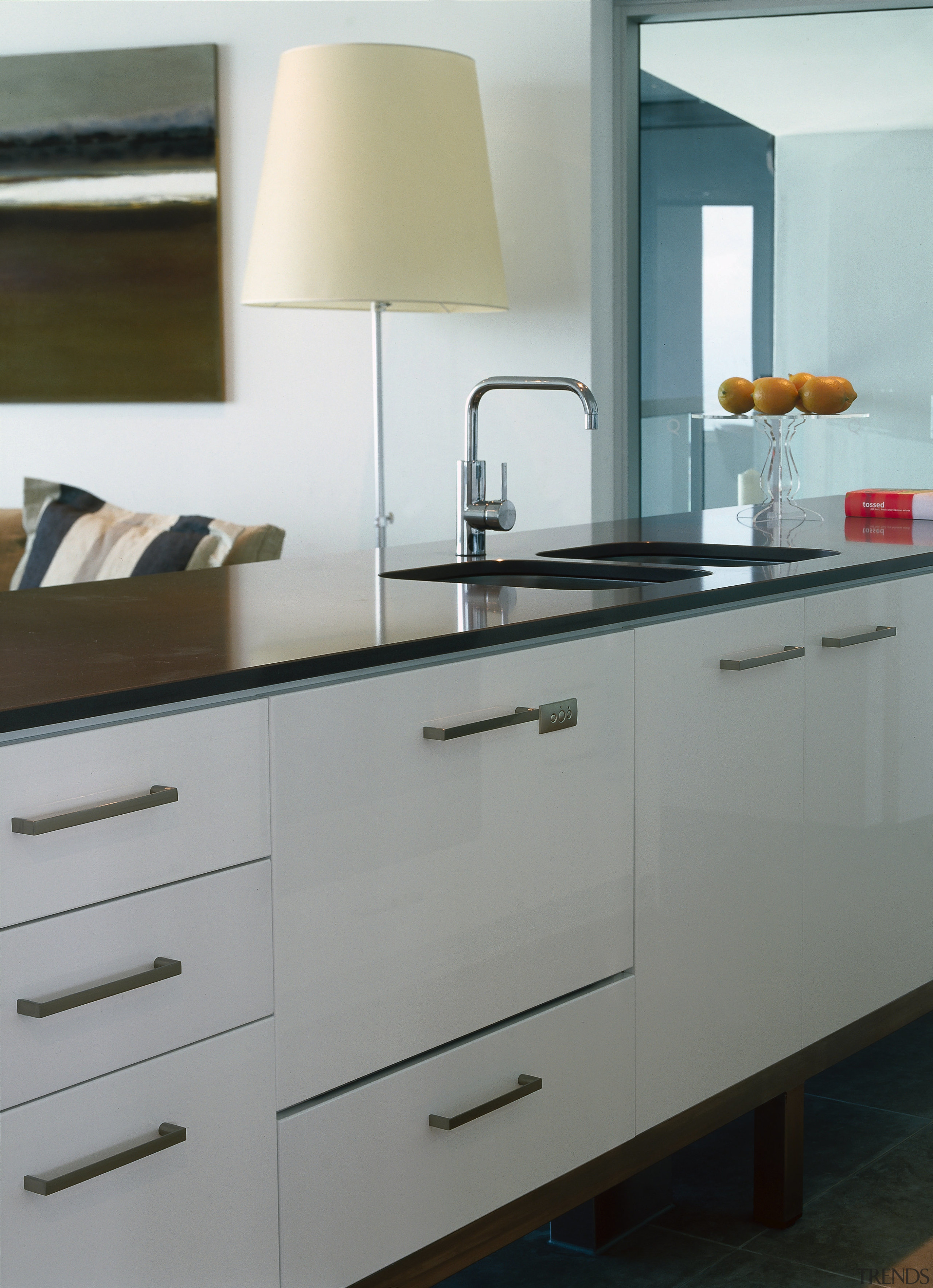 Kitchen with white cabinetry and black benchtop, and bathroom accessory, cabinetry, countertop, cuisine classique, furniture, home appliance, interior design, kitchen, kitchen stove, product design, sink, gray