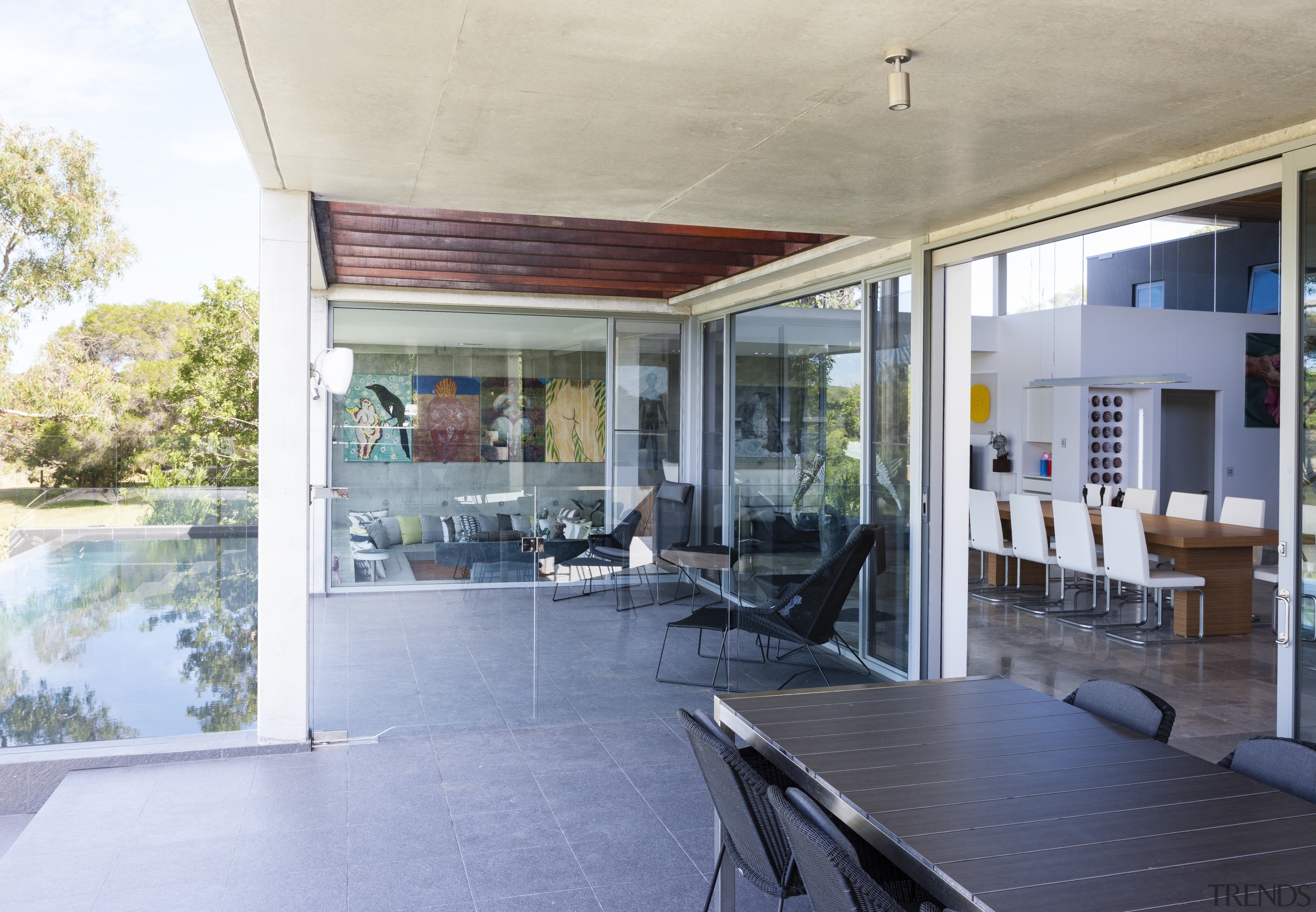 A terrace on this new home overlooks the architecture, balcony, daylighting, house, interior design, patio, property, real estate, roof, window, gray, white