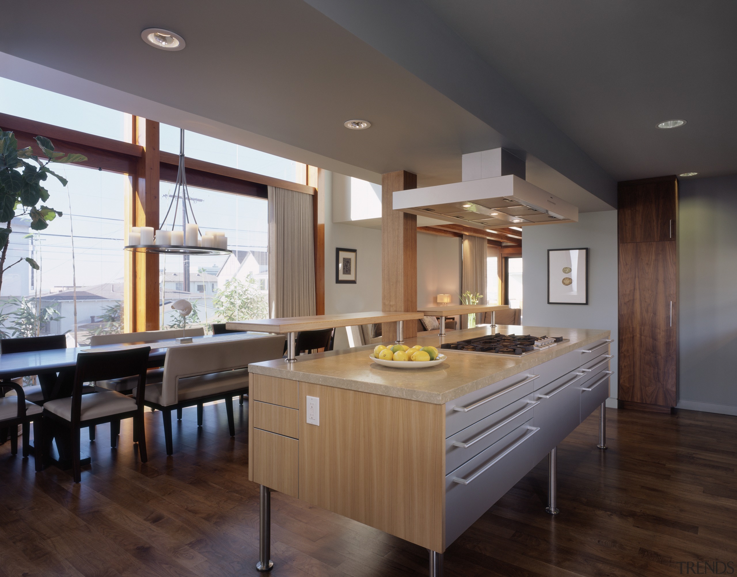 The kitchen is designed in a galley style cabinetry, countertop, cuisine classique, floor, flooring, hardwood, interior design, kitchen, room, wood flooring, gray