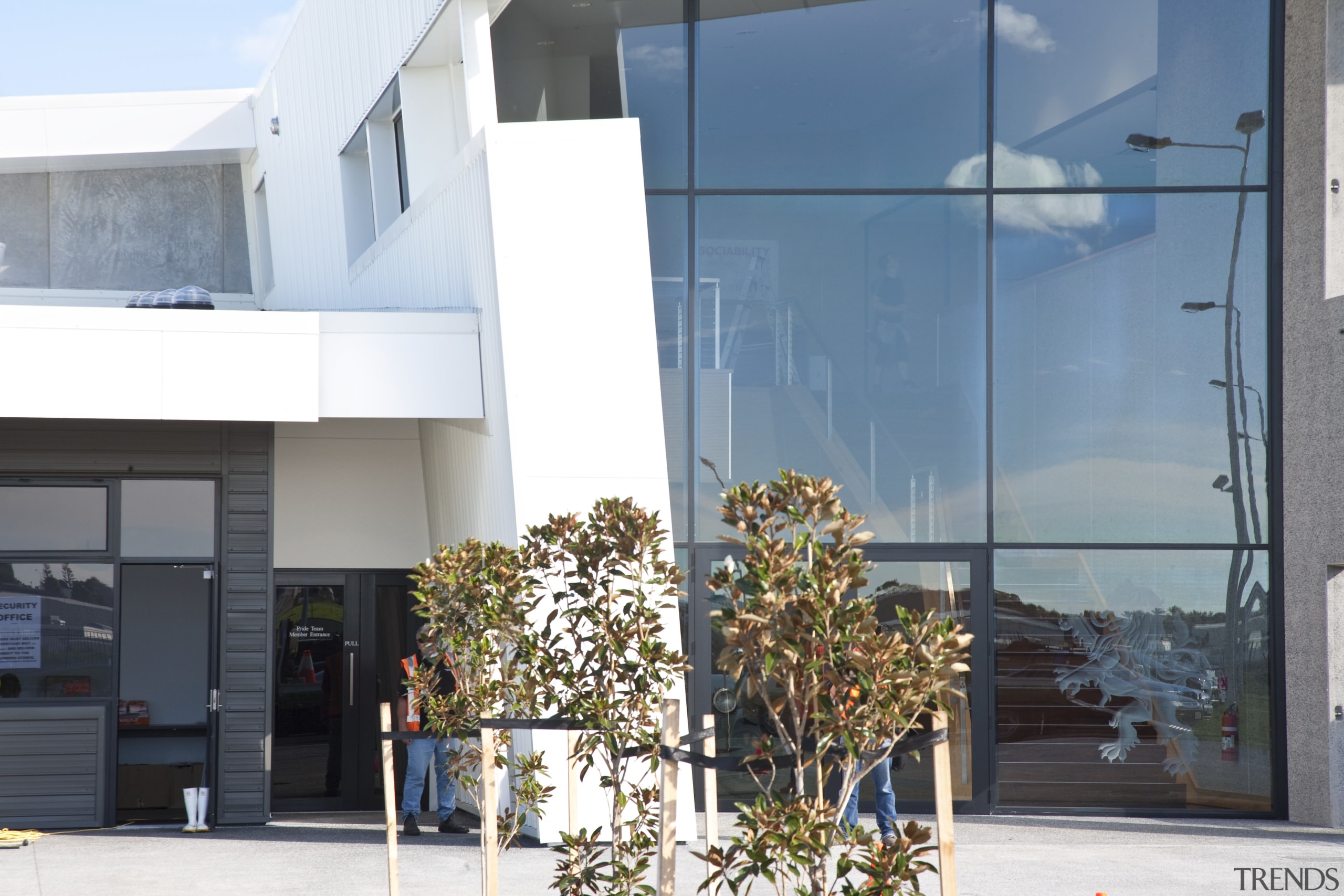 Exterior view of the Lion Nathan brewhouse which architecture, building, facade, glass, house, real estate, window, white