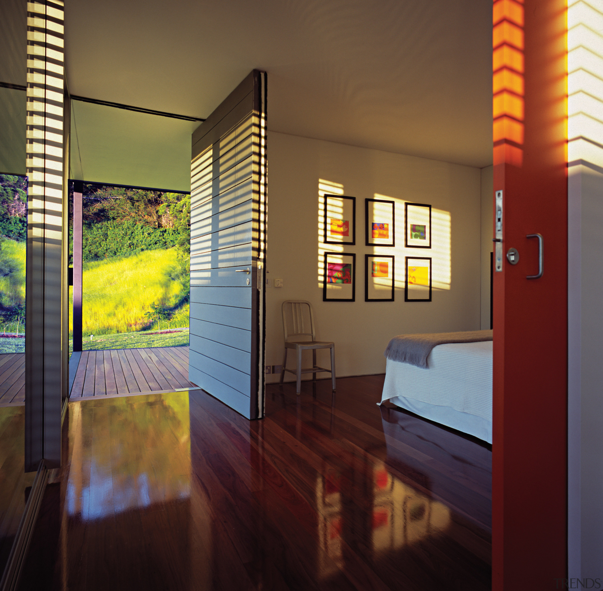 A view of the hallway featuring polished recycled architecture, home, house, interior design, real estate, room, window, brown, red