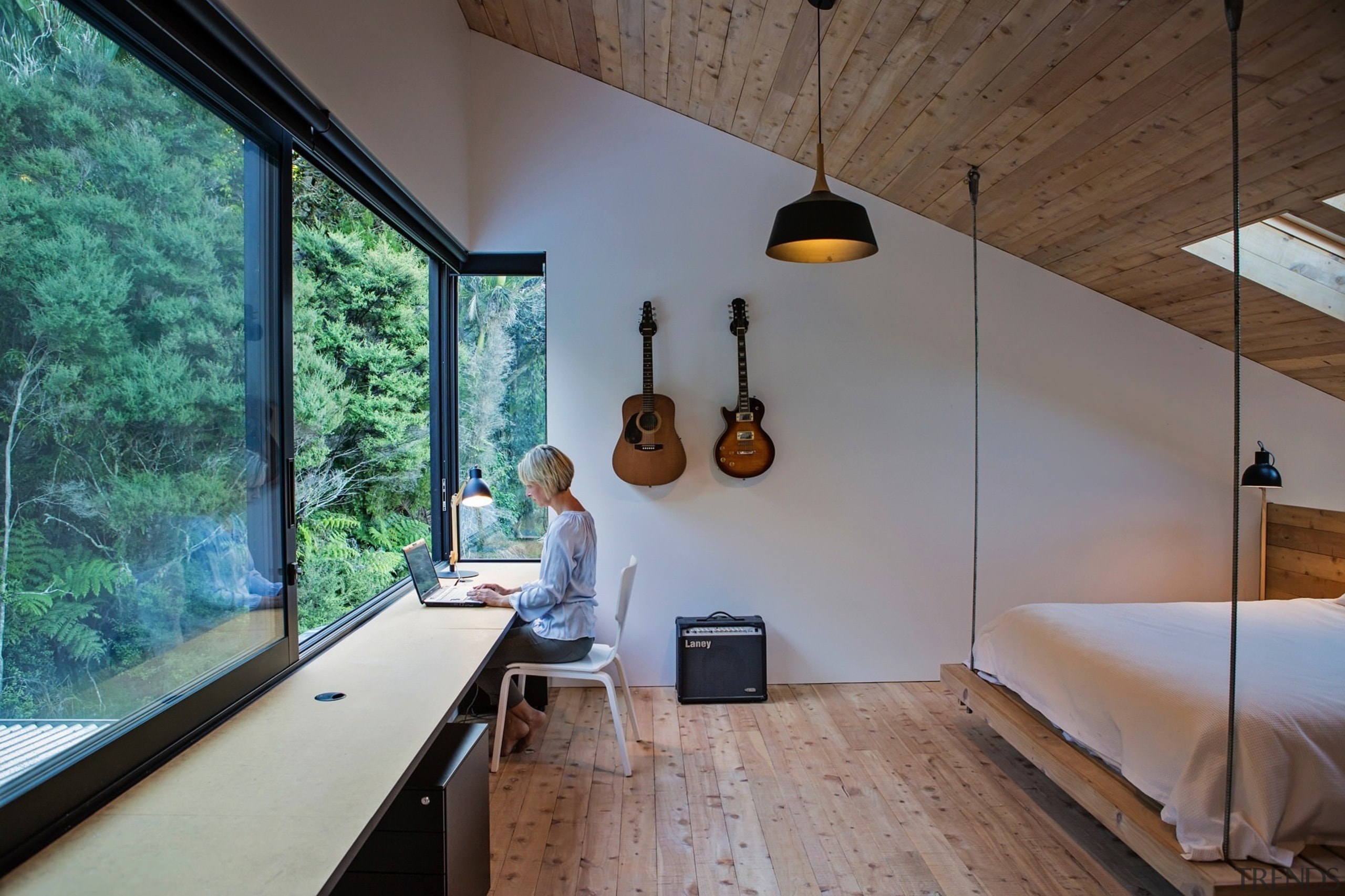 The bedroom is designed to look out to architecture, ceiling, daylighting, home, house, interior design, property, real estate, room, window, wood, gray