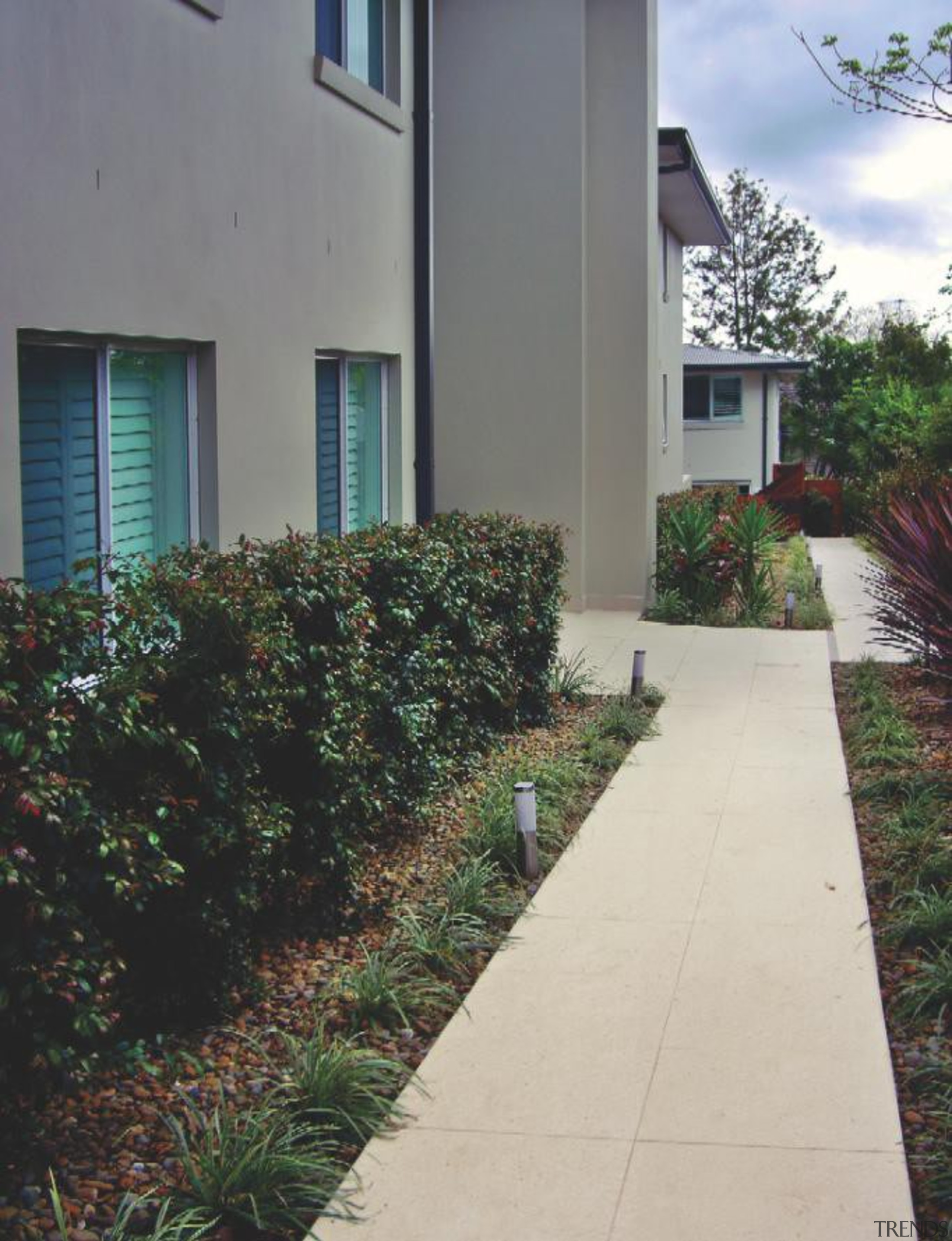 Gem ivory outdoor walkway - RAK Gem Outdoors backyard, courtyard, estate, facade, garden, grass, home, house, landscape, landscaping, plant, property, real estate, residential area, shrub, siding, walkway, wall, yard, gray, black