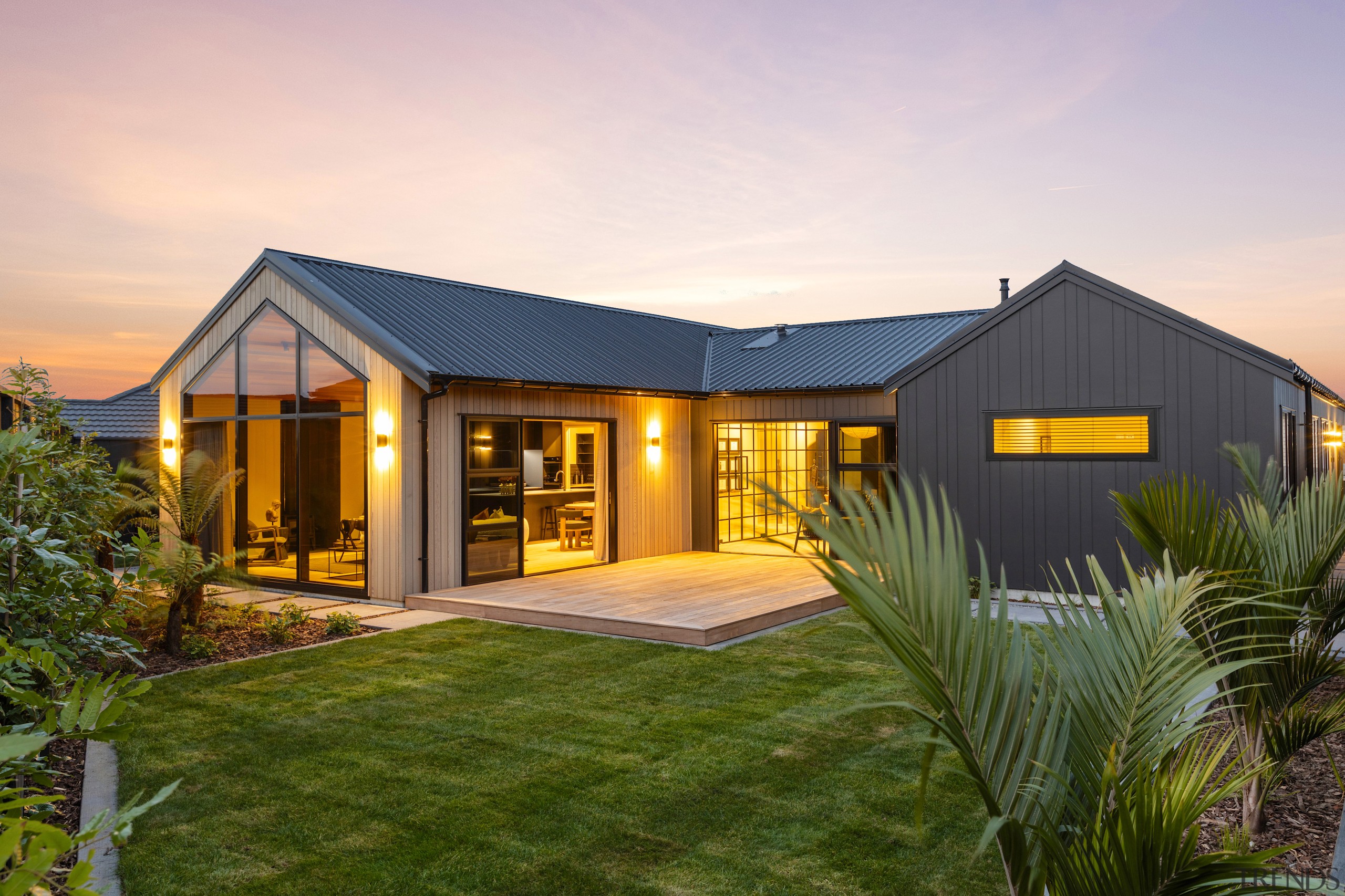 The rear of the home at dusk – 