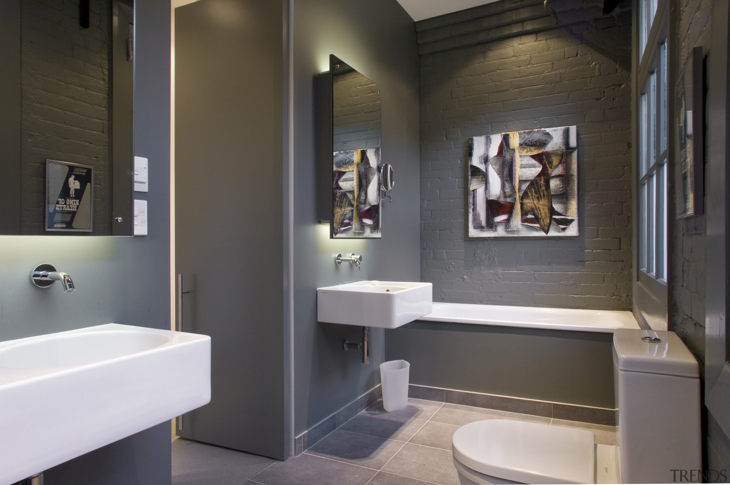 The master bathroom features dark Grey walls and bathroom, interior design, room, black, gray