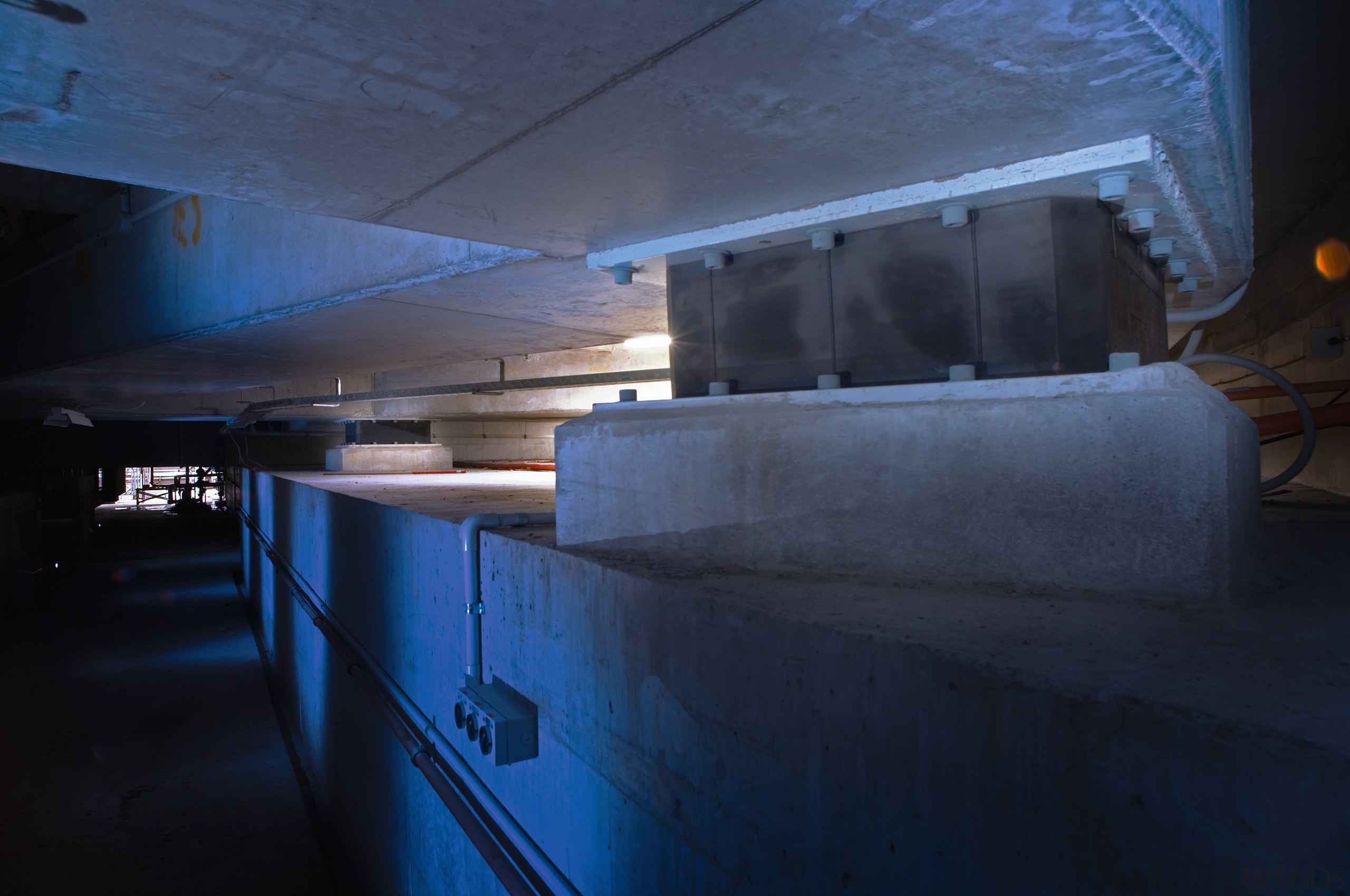 View of earthquake protection system at base of architecture, blue, darkness, light, black, blue