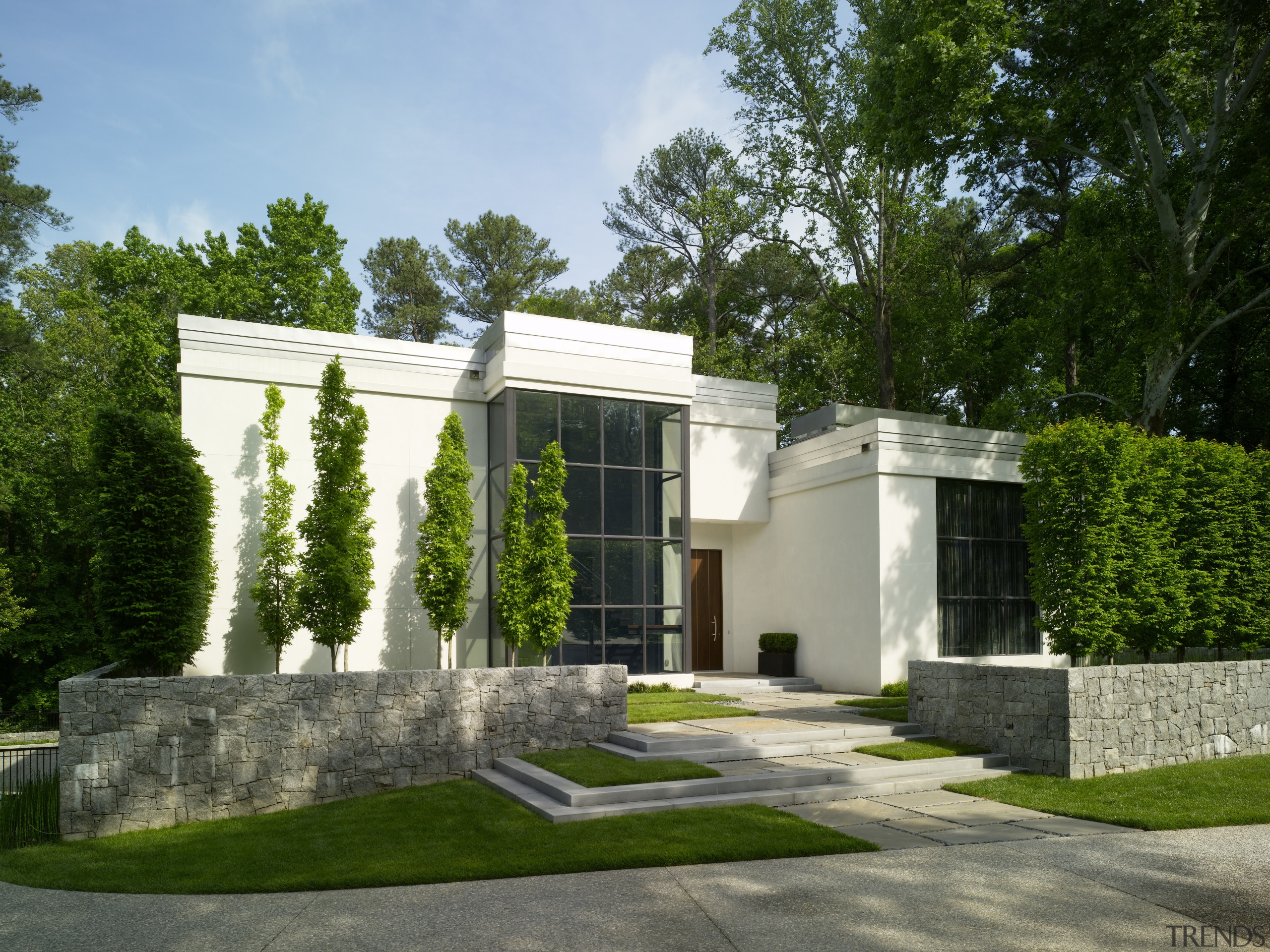 View of white home. - View of white architecture, estate, facade, home, house, mansion, property, real estate, residential area, green