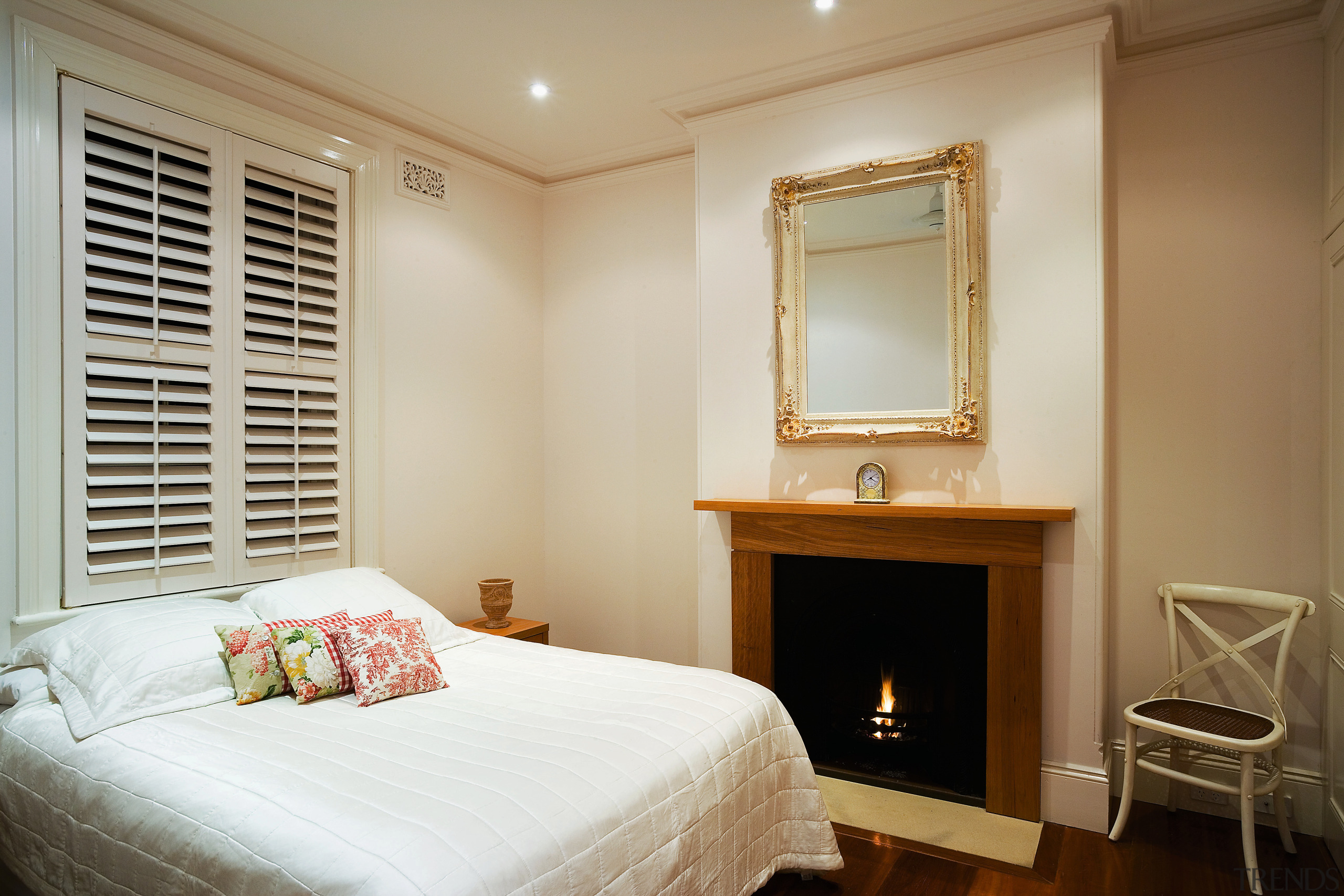 A viewof a bedroom, wooden flooring and fireplace, bedroom, ceiling, furniture, home, interior design, property, real estate, room, suite, window, window covering, brown, gray