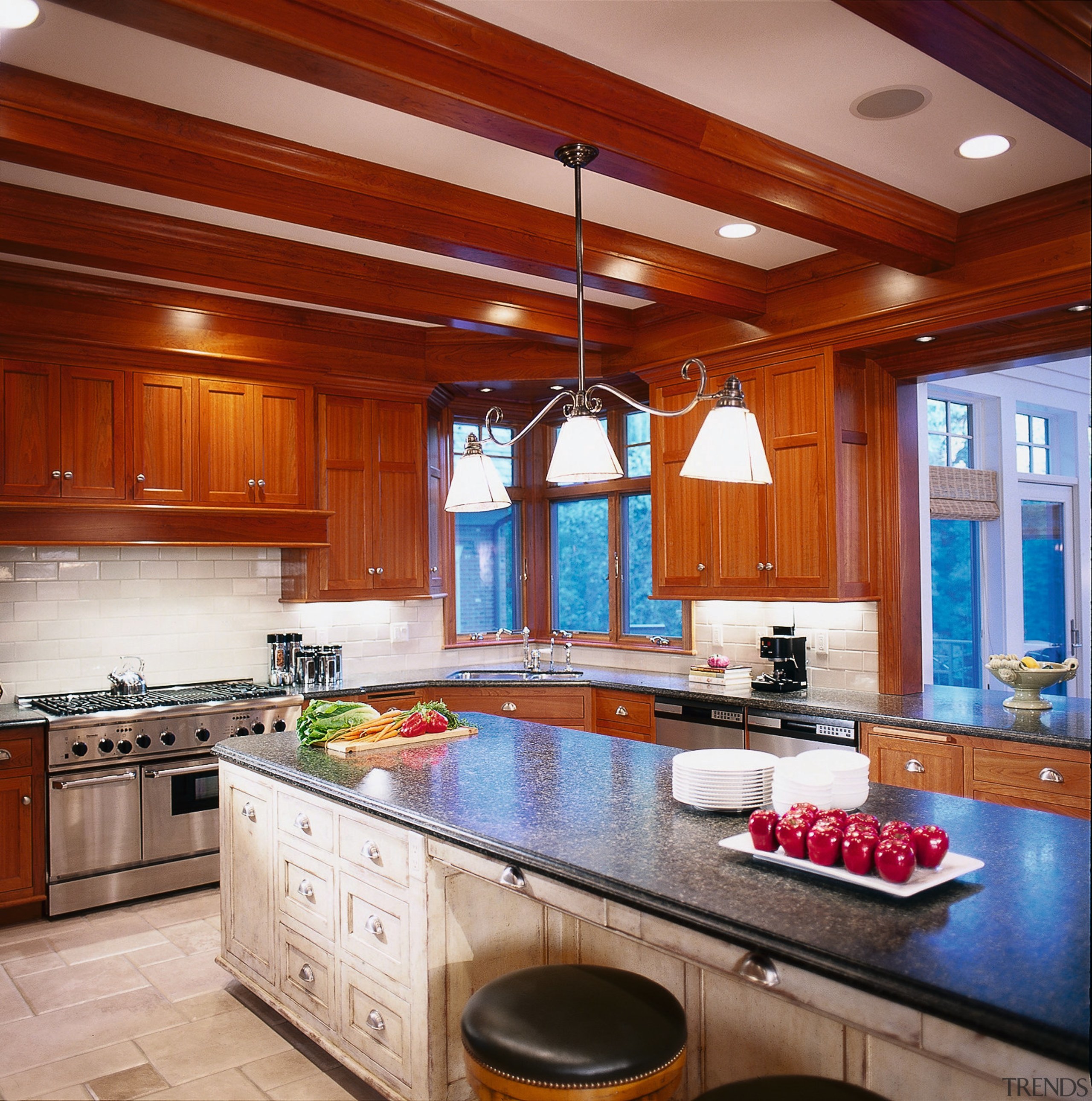 view of the kitchen showing nautral cherry millwork cabinetry, ceiling, countertop, estate, hardwood, home, interior design, kitchen, lighting, real estate, room, red