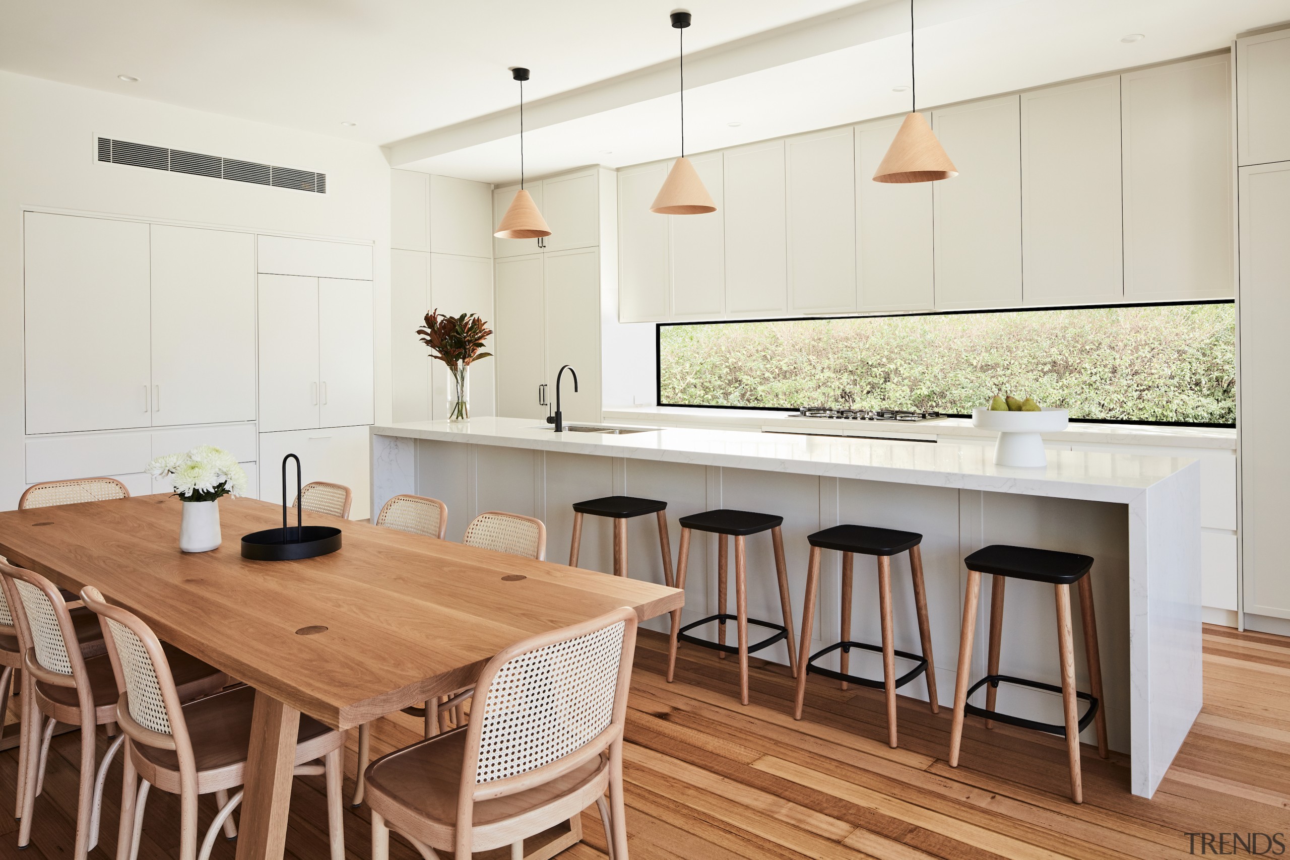 30 Degrees pendants complete the kitchen dining area. 