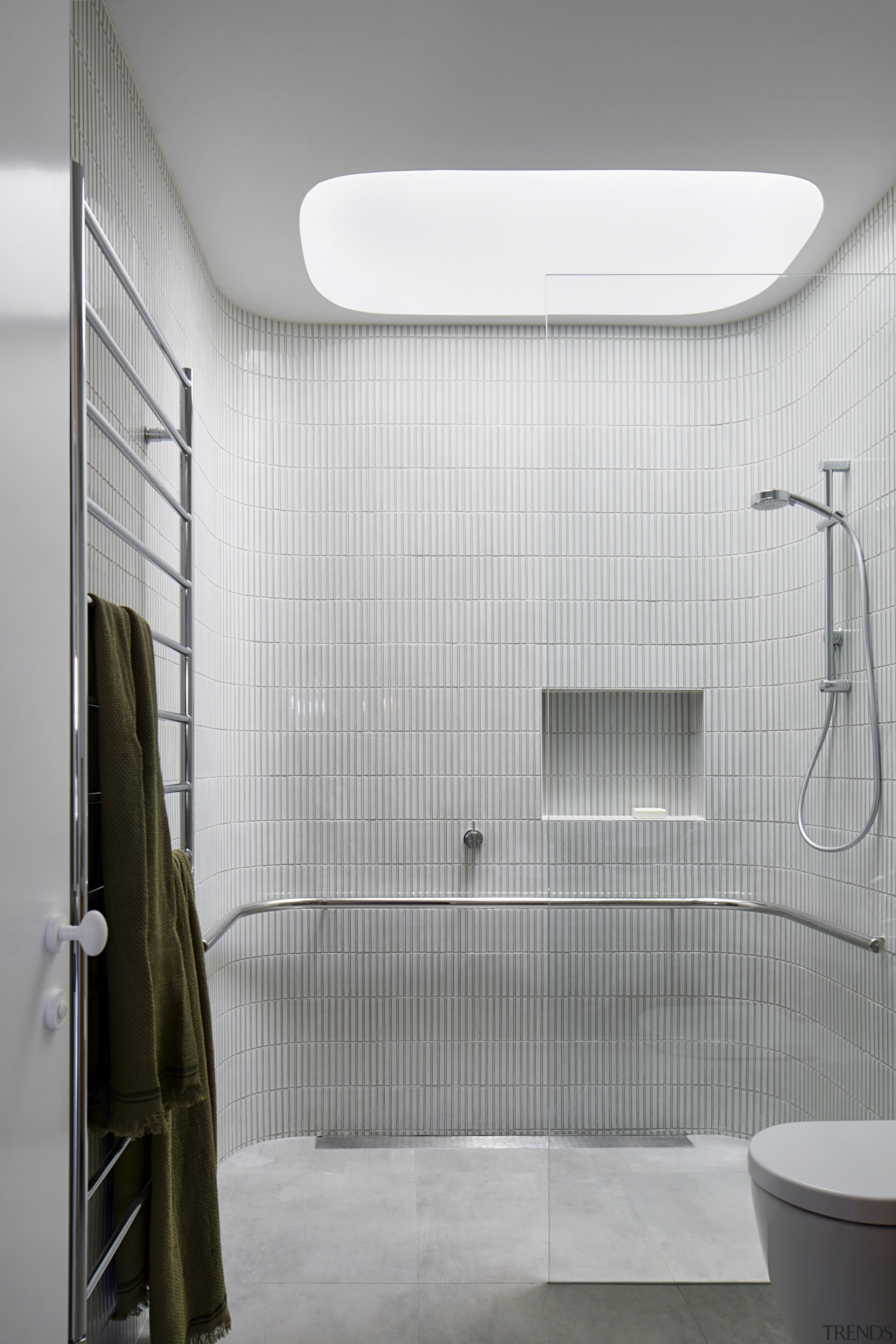 A feature skylight over the shower enclosure has 