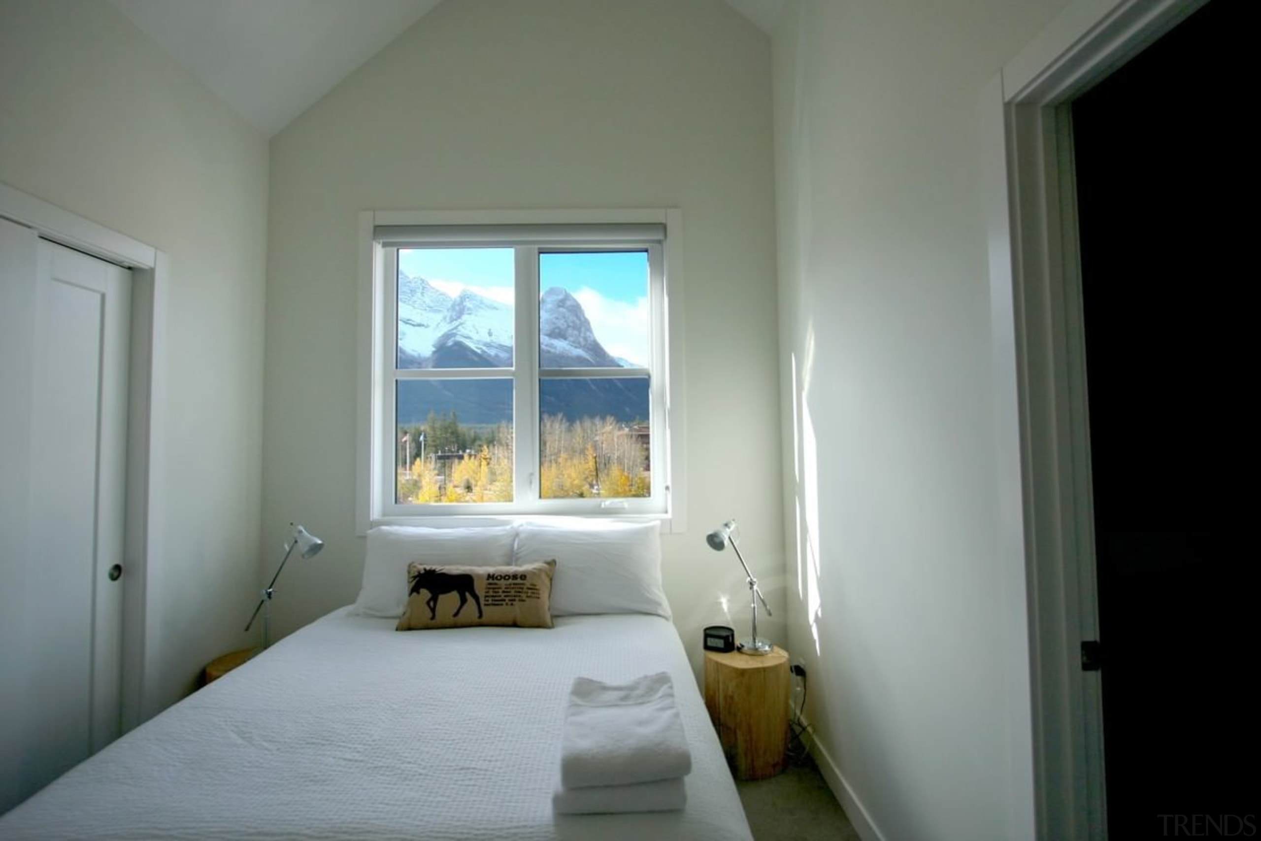 From the looks of things, this square window architecture, bedroom, ceiling, daylighting, door, estate, home, house, interior design, property, real estate, room, window, wood, gray