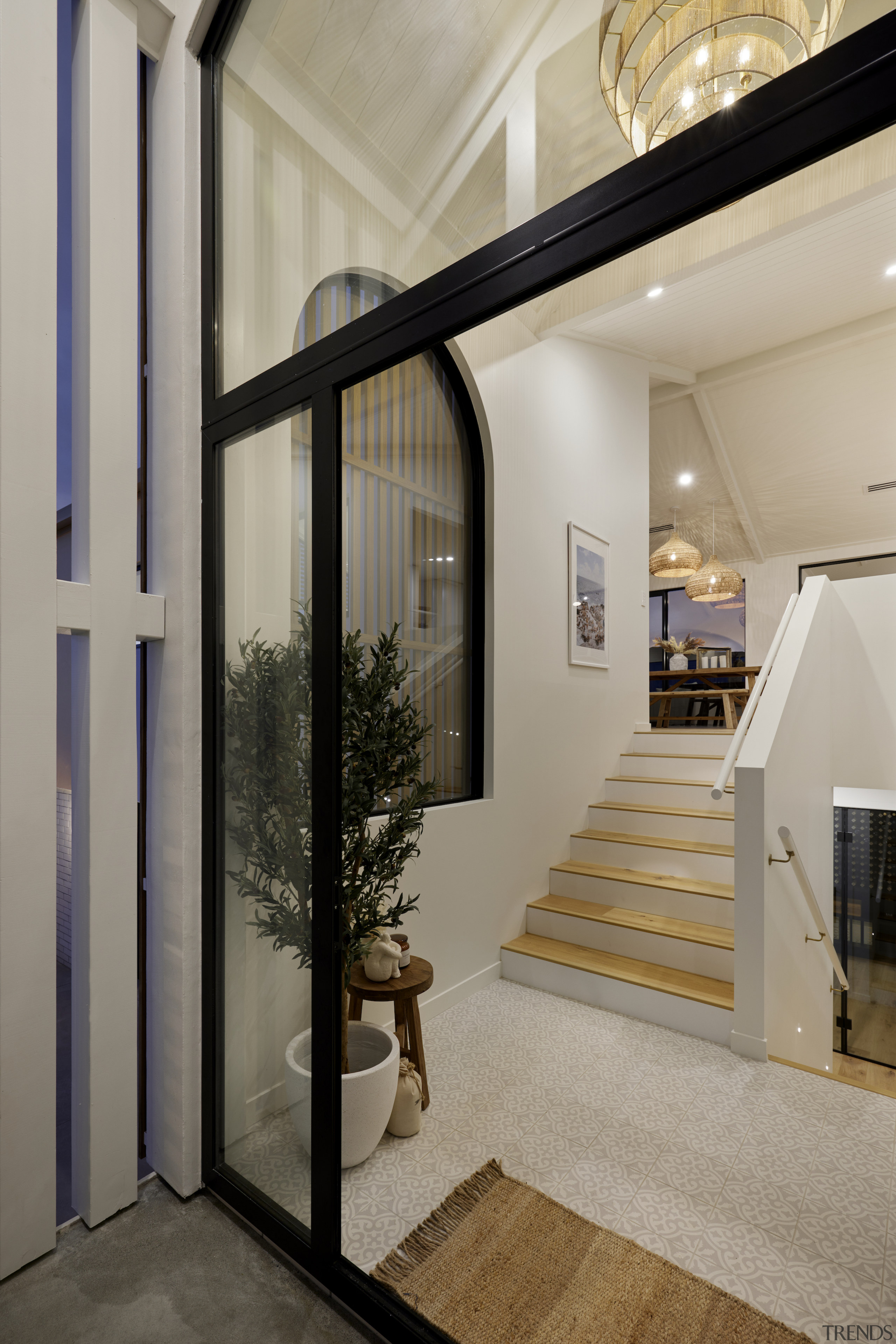 The entryway includes a design motif that runs 