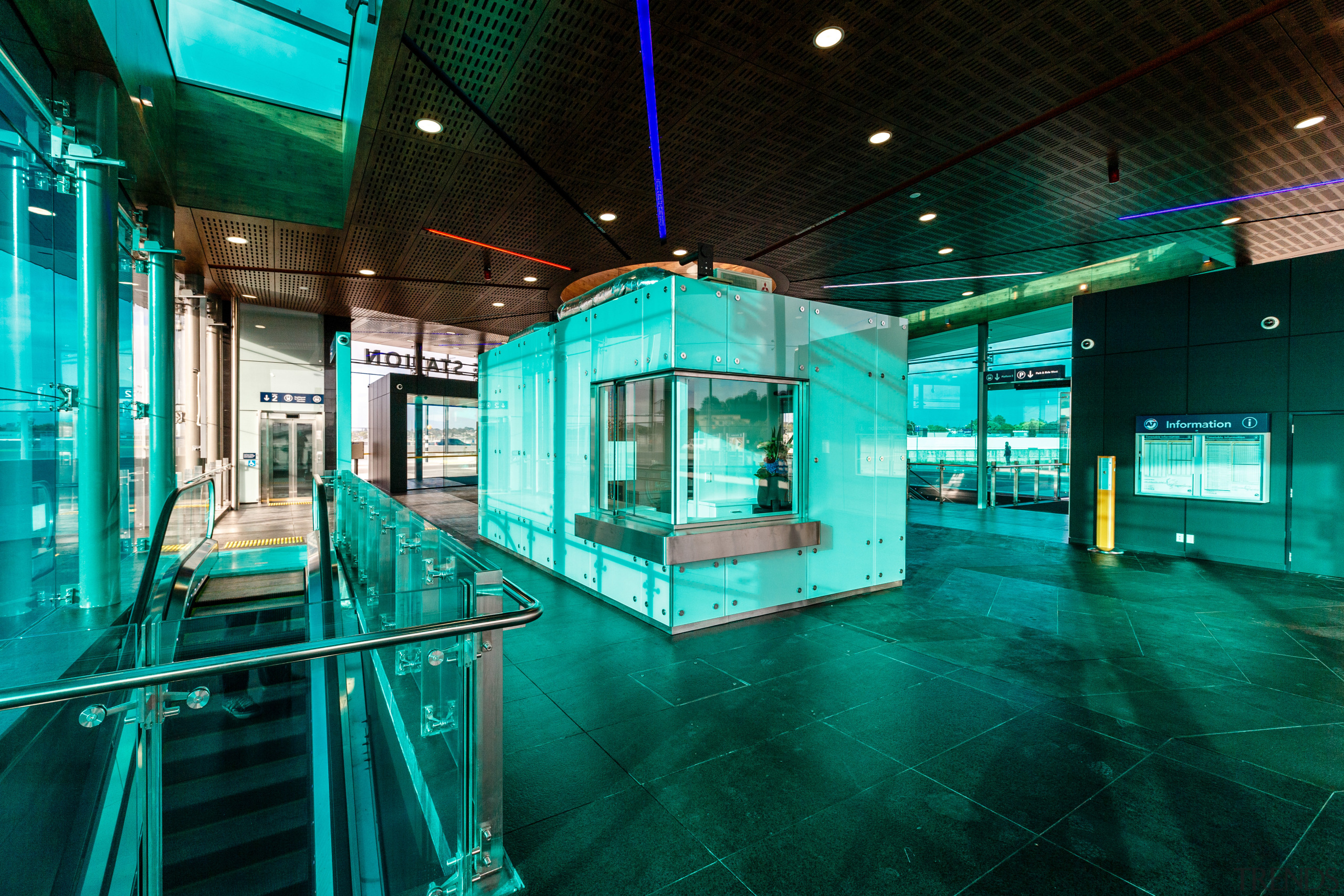A substantial, timber-clad gullwing roof appears to float architecture, blue, glass, leisure, leisure centre, lighting, structure, tourist attraction, teal