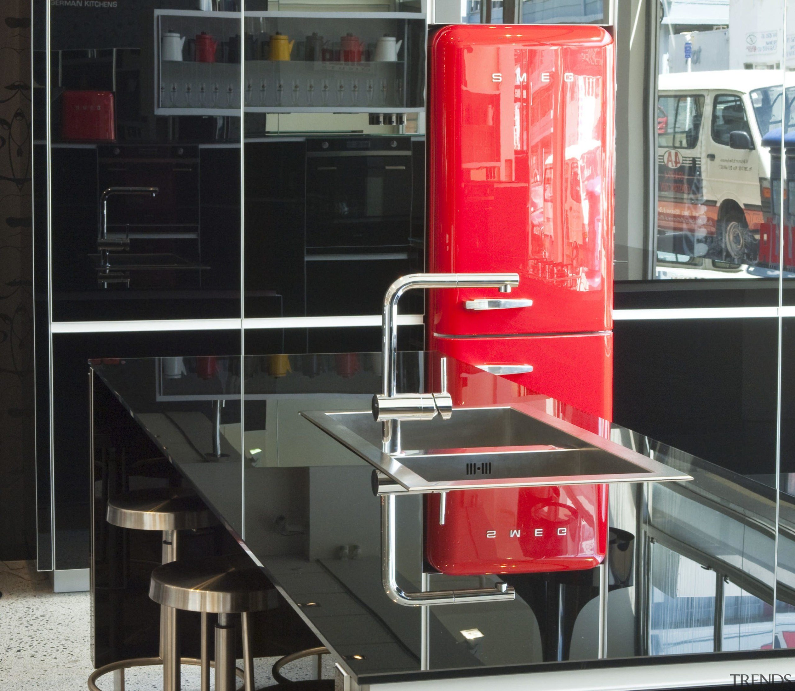 Adding a Smeg 50s style red refrigerator creates furniture, product, black