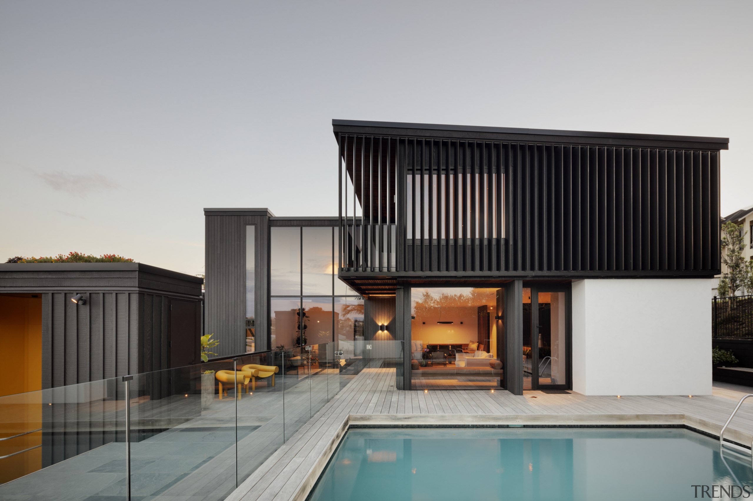 1970's home becomes a modern entertainer's dream - architecture, building, design, estate, facade, home, house, interior design, property, real estate, residential area, roof, room, sky, swimming pool, wood, gray