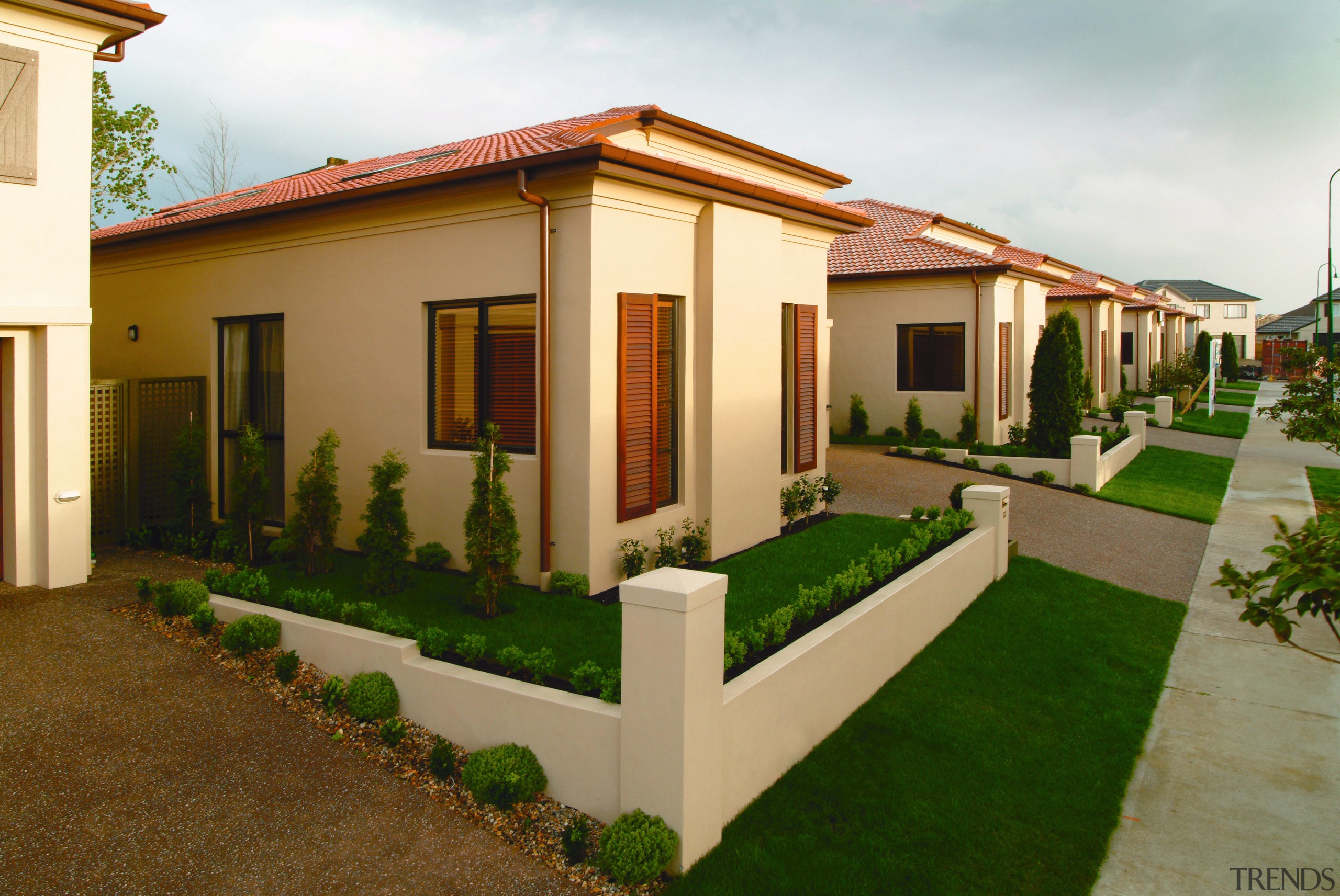 view of the home built in dryblock and estate, facade, home, house, property, real estate, residential area, villa, brown