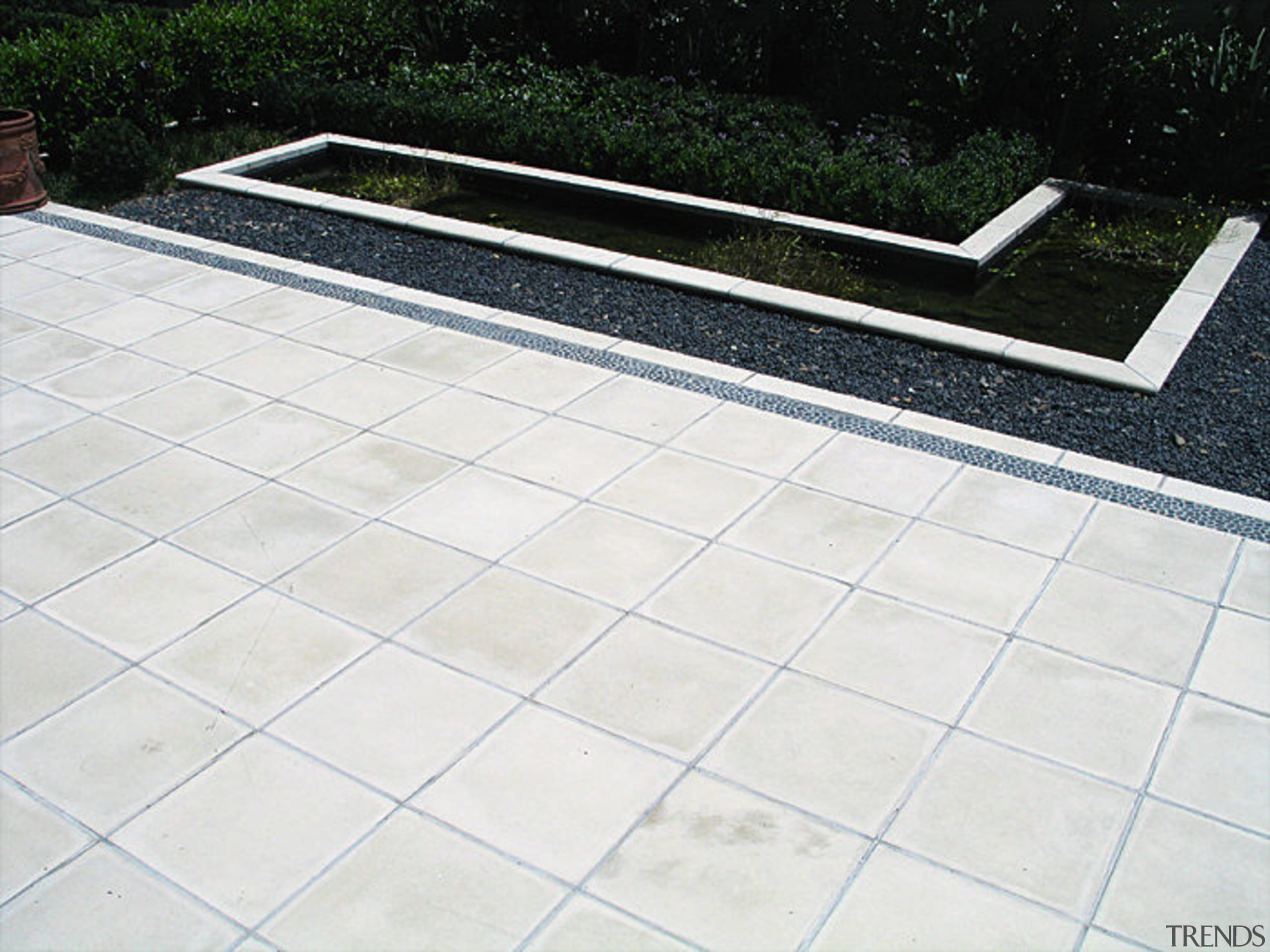 View of close up of patio paving - daylighting, floor, flooring, line, road surface, tile, white, black