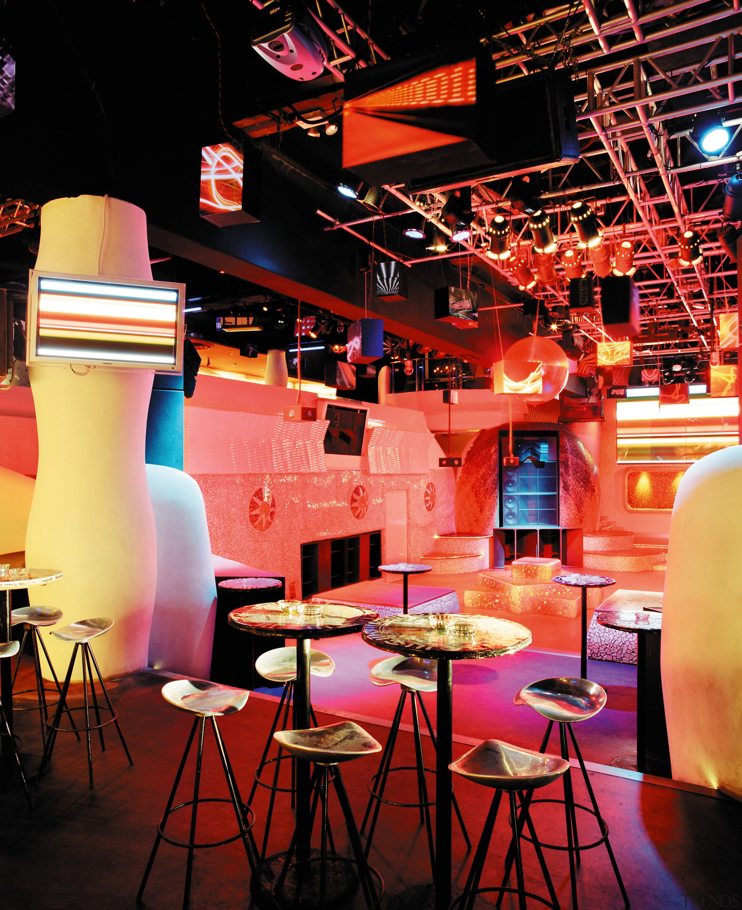view of the dancefloor featuring end grain wood design, interior design, lighting, restaurant, stage, table, black, red
