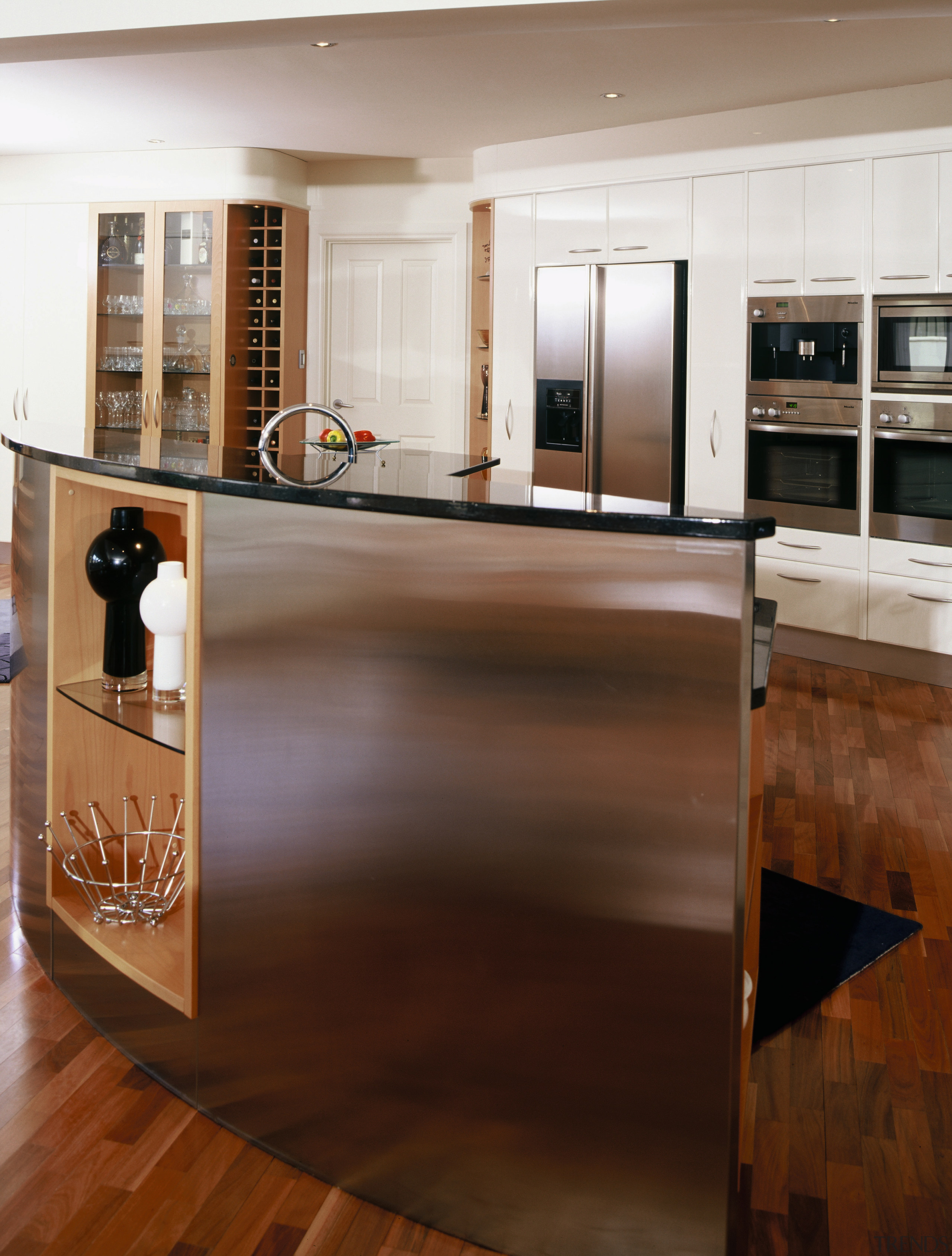 View of kitchen showing back of bench, with cabinetry, countertop, floor, flooring, furniture, hardwood, interior design, kitchen, laminate flooring, room, wood, wood flooring, wood stain, brown