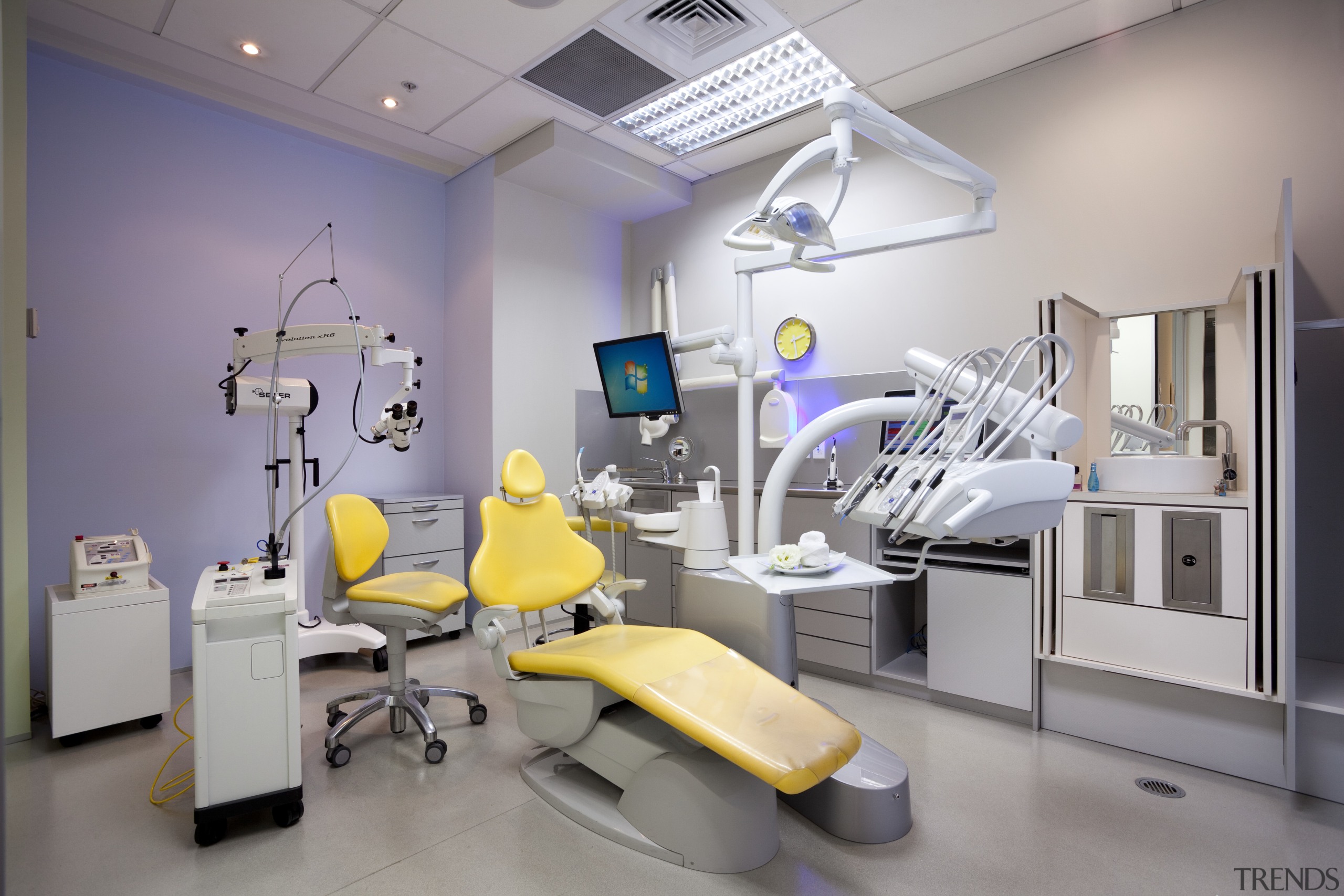 View of dentist's surgery with purple wall and clinic, health care, hospital, interior design, medical, medical equipment, operating theater, product, product design, service, gray