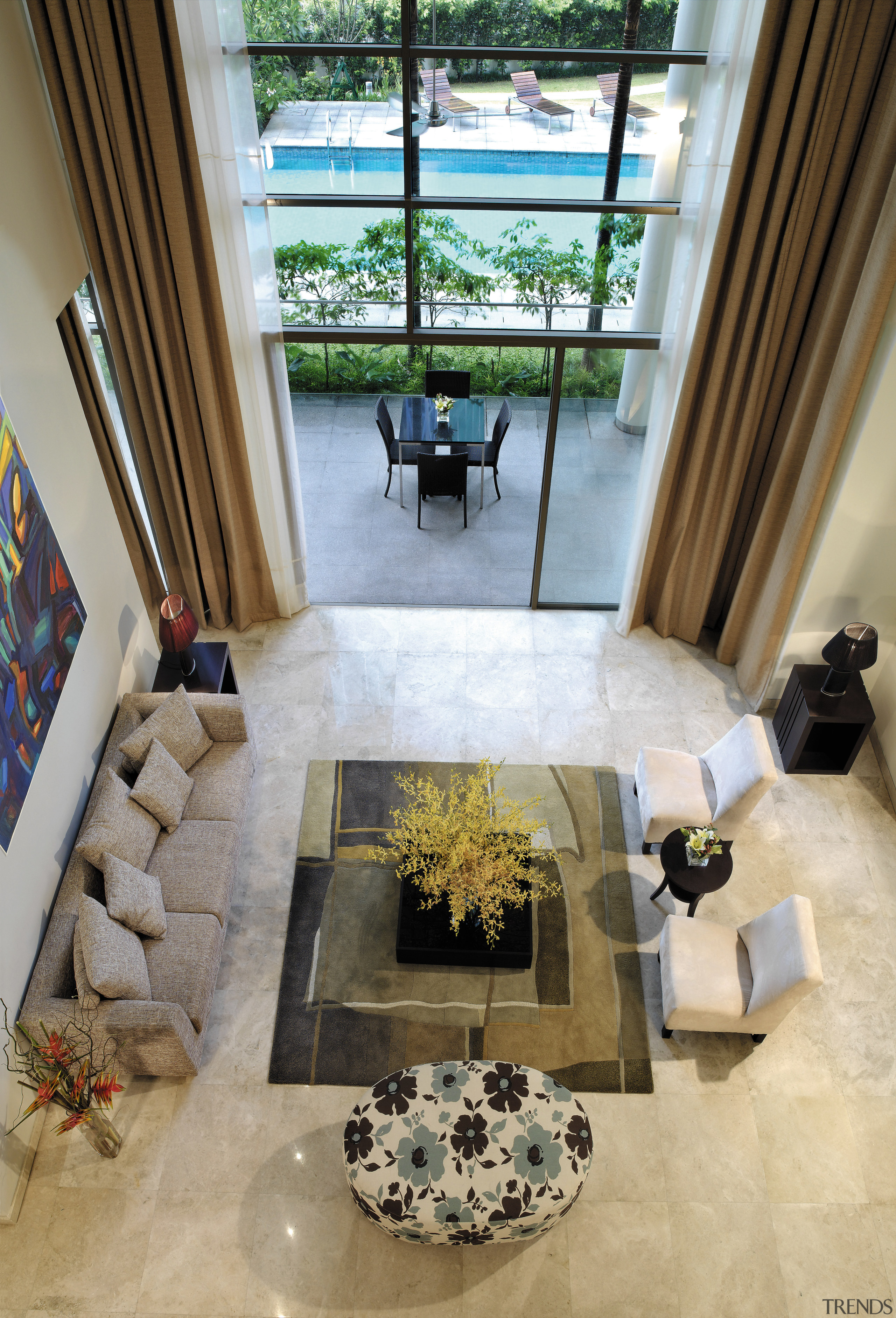 A view of the living area, cream carpet estate, floor, flooring, home, interior design, living room, room, table, window, gray, brown