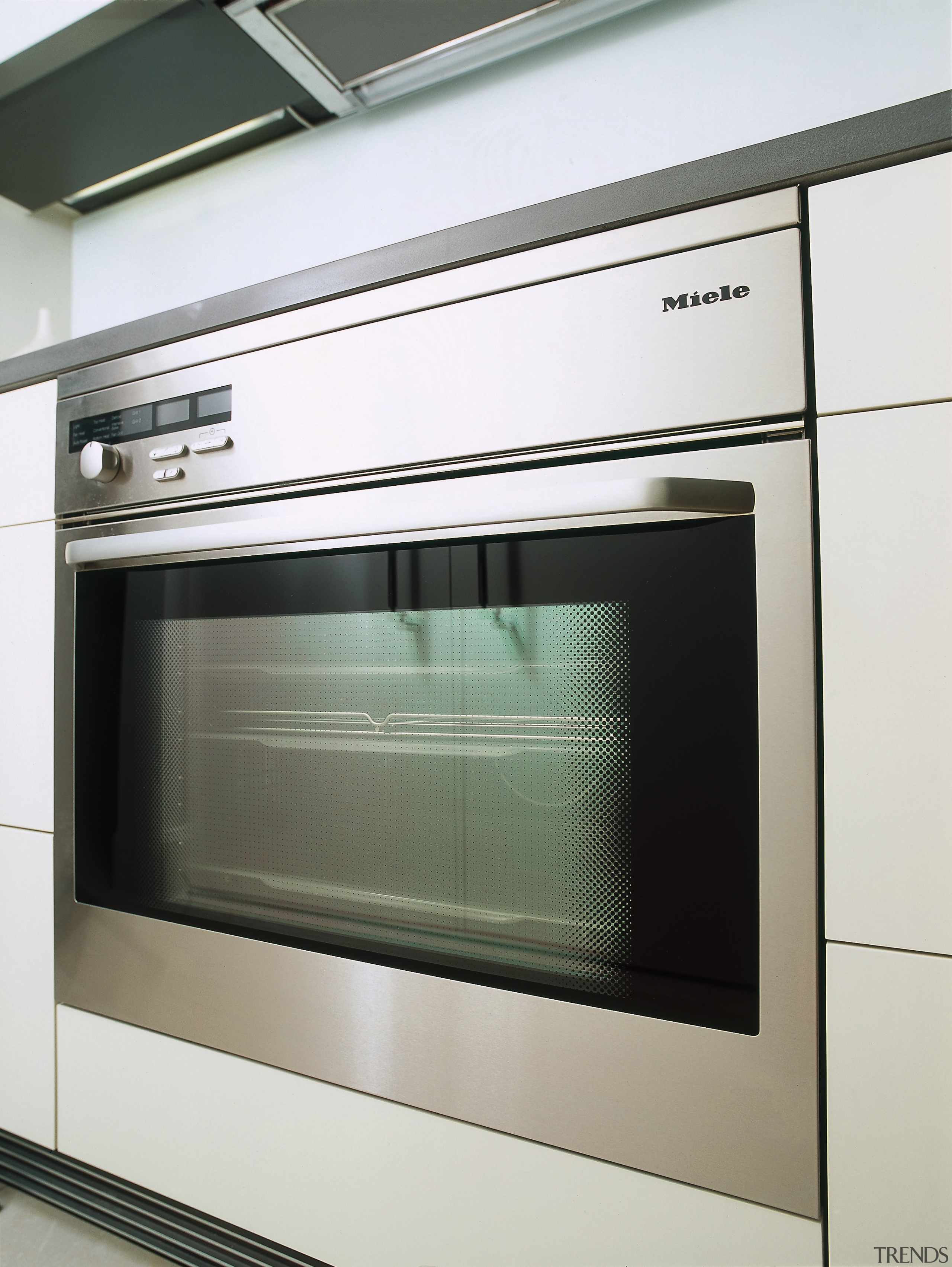 close up of oven - close up of home appliance, kitchen appliance, kitchen stove, major appliance, microwave oven, oven, gray, white