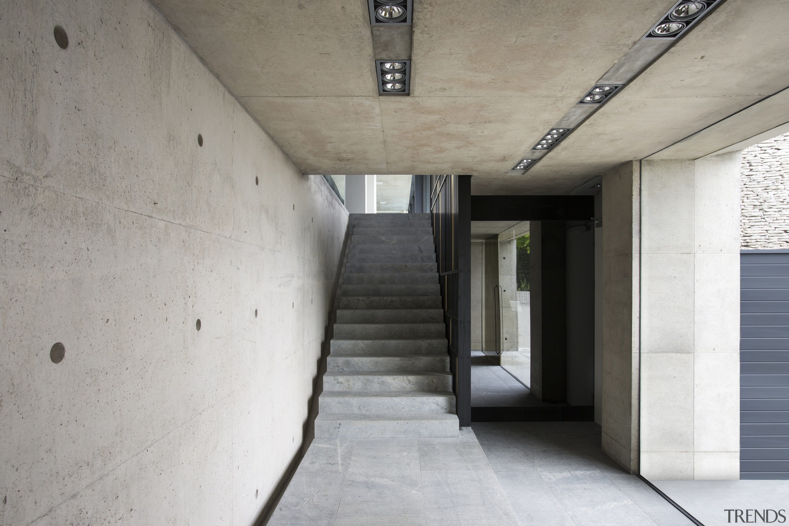 The shuttered concrete surface continues on the walls architecture, concrete, daylighting, house, gray