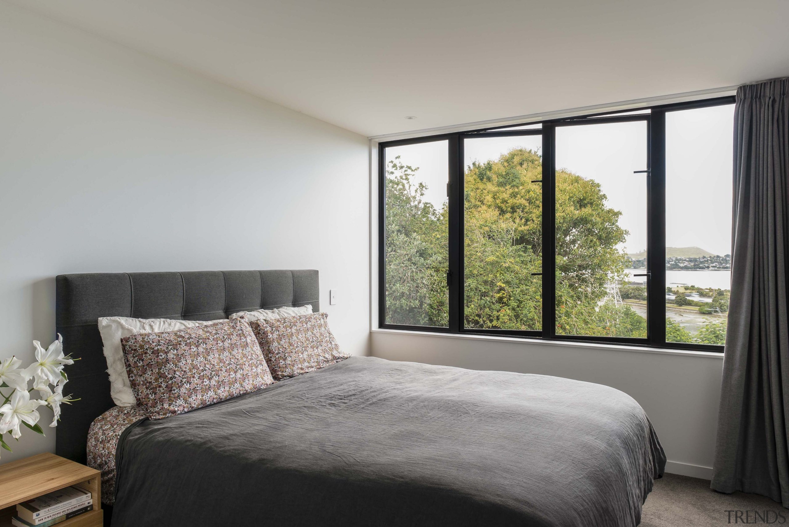 The home, this bedroom included, offers views all 