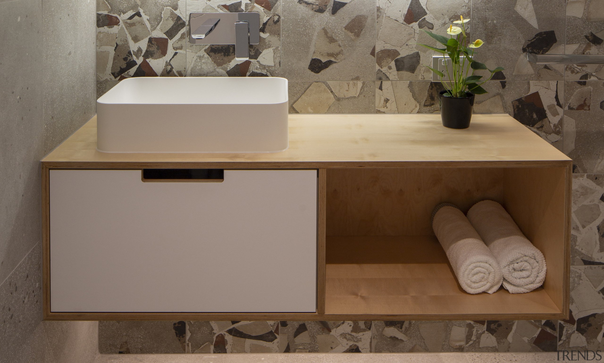 Cantilevering the vanity adds to the bathroom's sense 