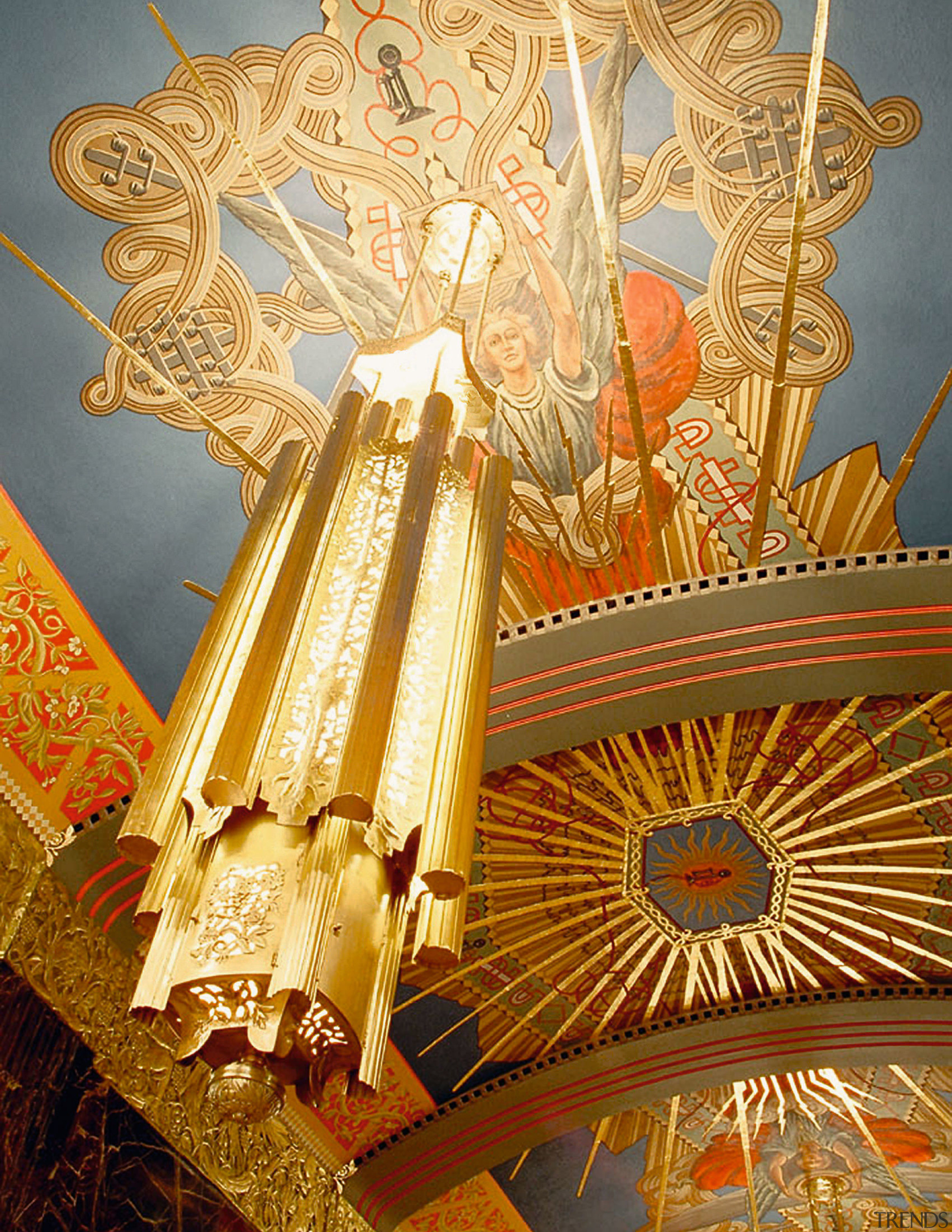 A close up view of a large pendulum art, yellow, orange, brown