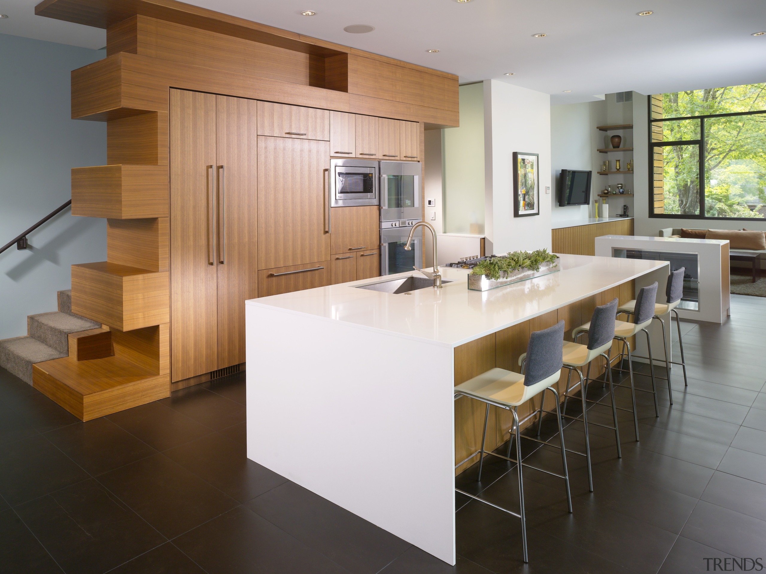 View of kitchen with white breakfast bar and architecture, countertop, floor, flooring, interior design, kitchen, real estate, table, gray