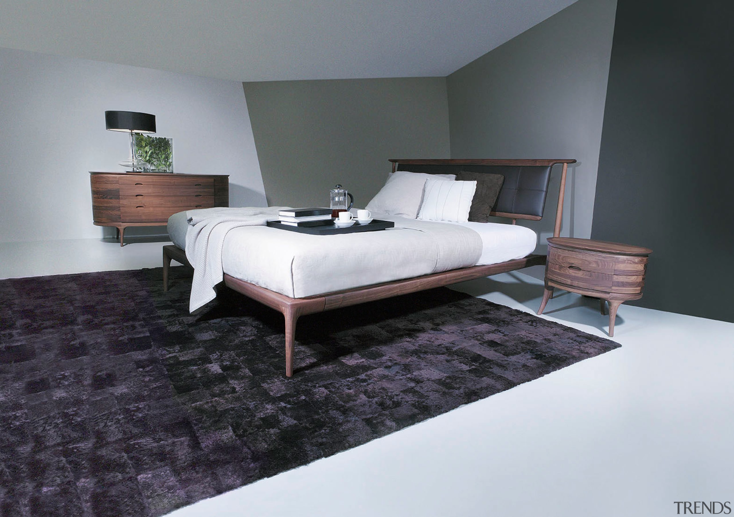 A view of some furniture from Domus Design. bed, bed frame, bedroom, floor, flooring, furniture, interior design, mattress, room, suite, wood, black, gray, white