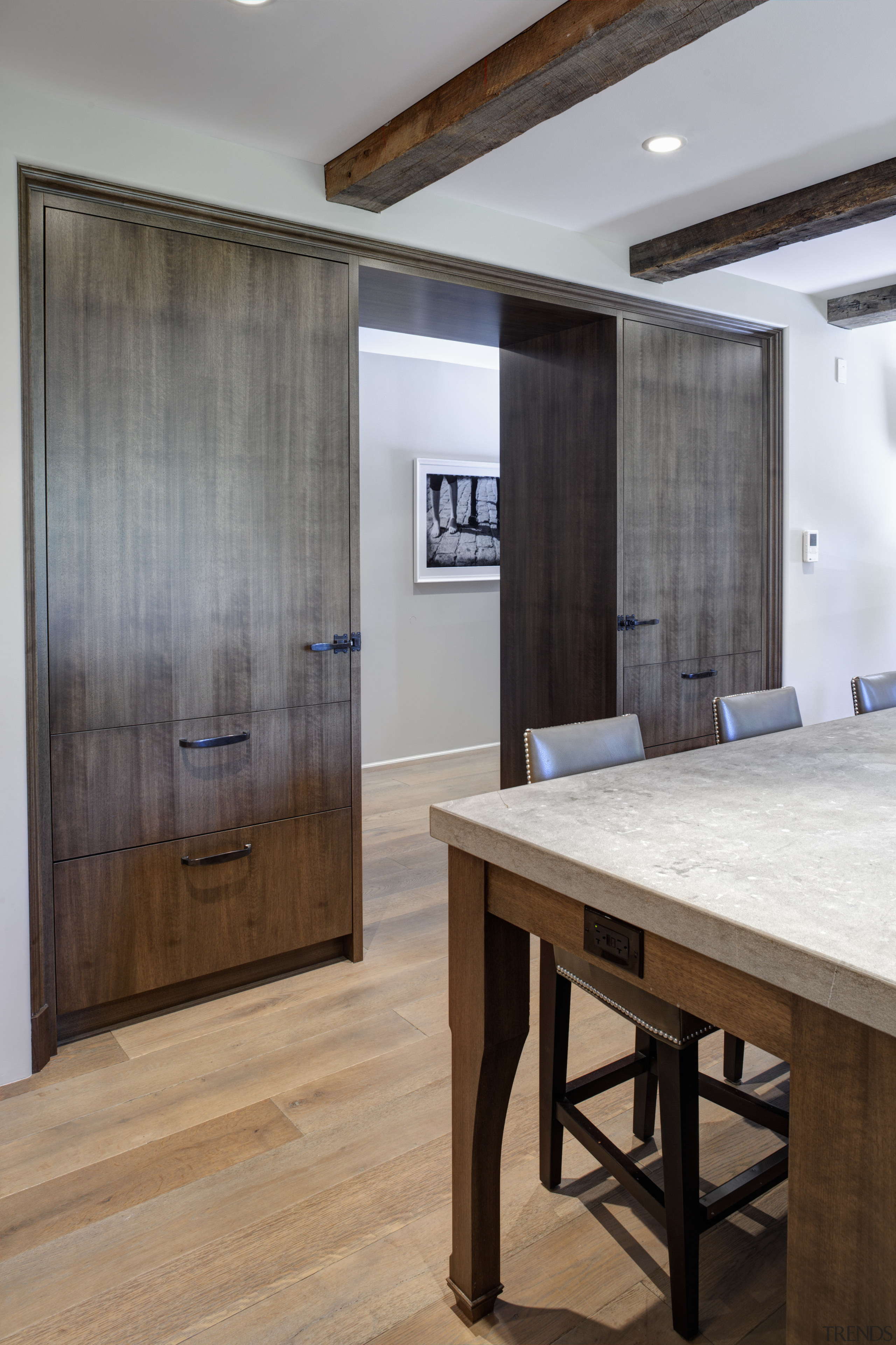 In this kitchen remodel by Doug Durbin, the ceiling, floor, flooring, furniture, interior design, wall, wood, wood flooring, gray