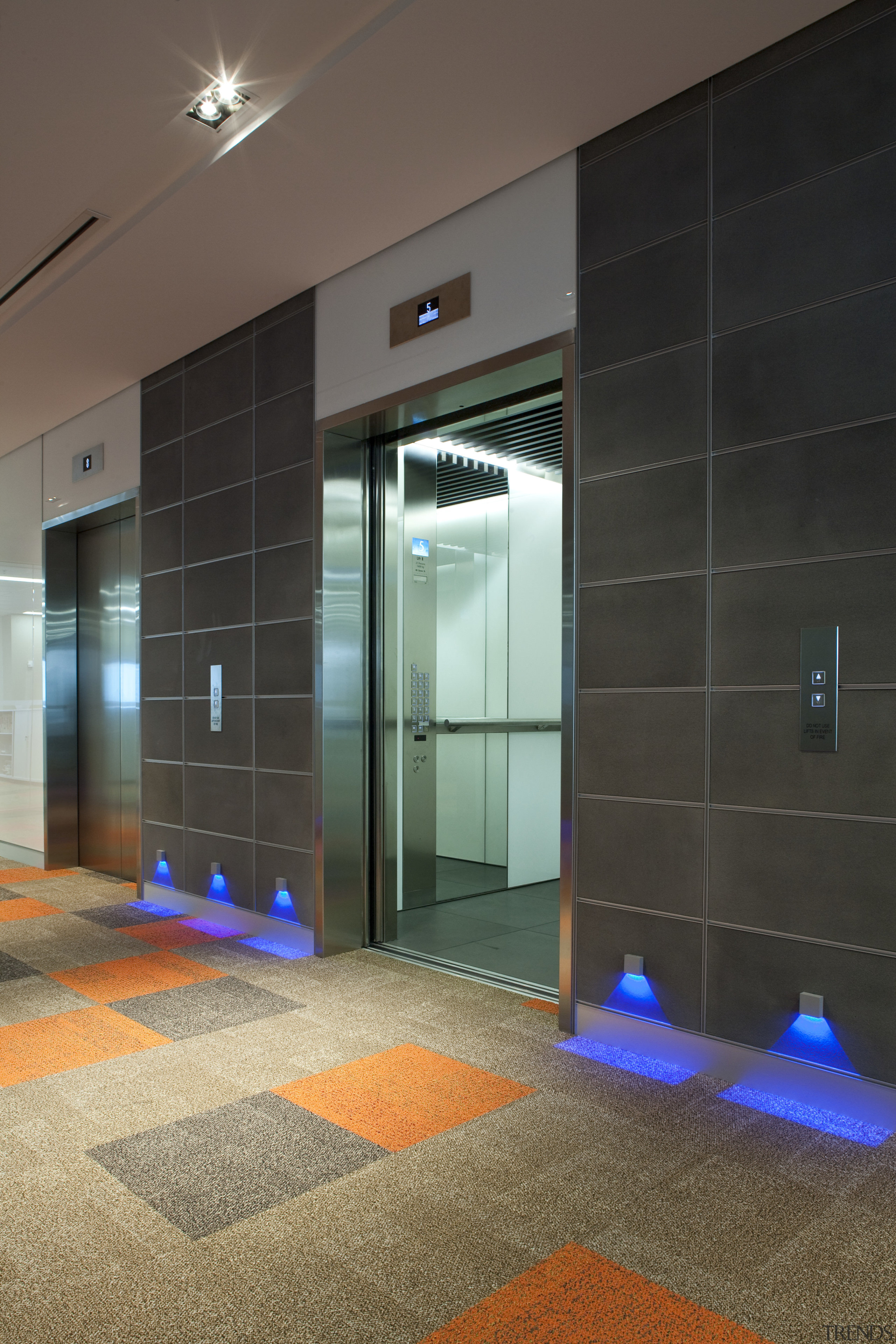 View of the elevator lobby at the Deloitte architecture, ceiling, floor, flooring, glass, interior design, lobby, black, brown