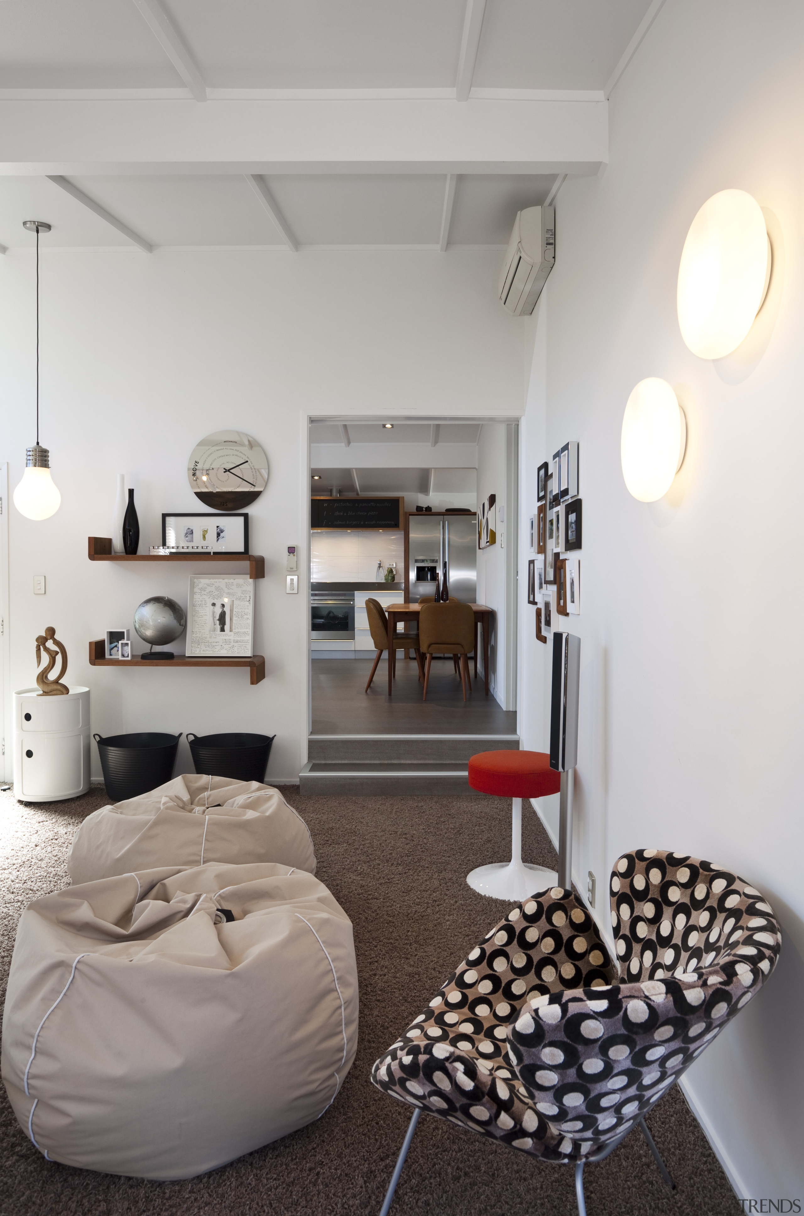 Yellow Fox were the designers for this renovation. ceiling, furniture, home, interior design, light fixture, living room, product design, room, table, gray
