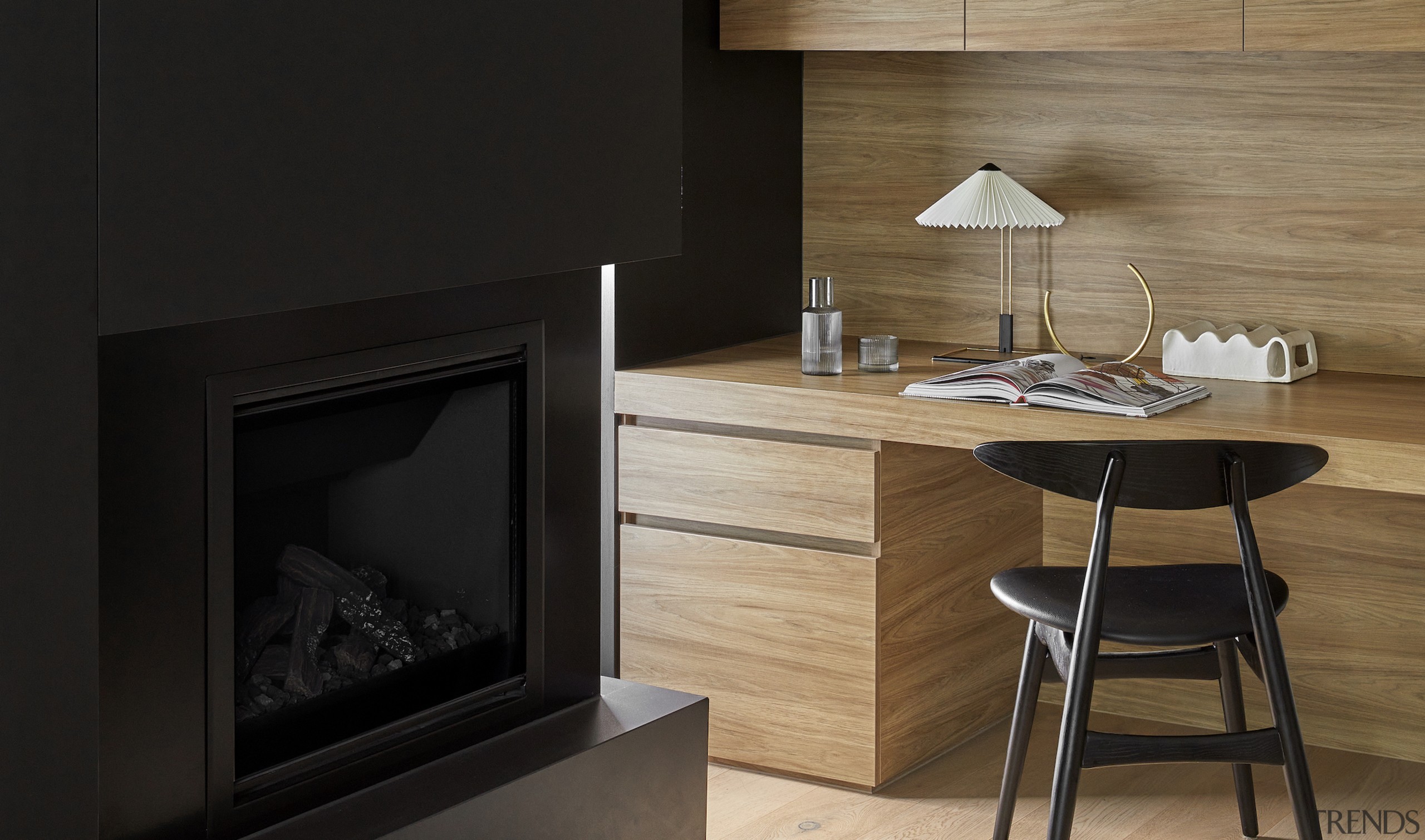 The library/study complete with built-in joinery and fire. 