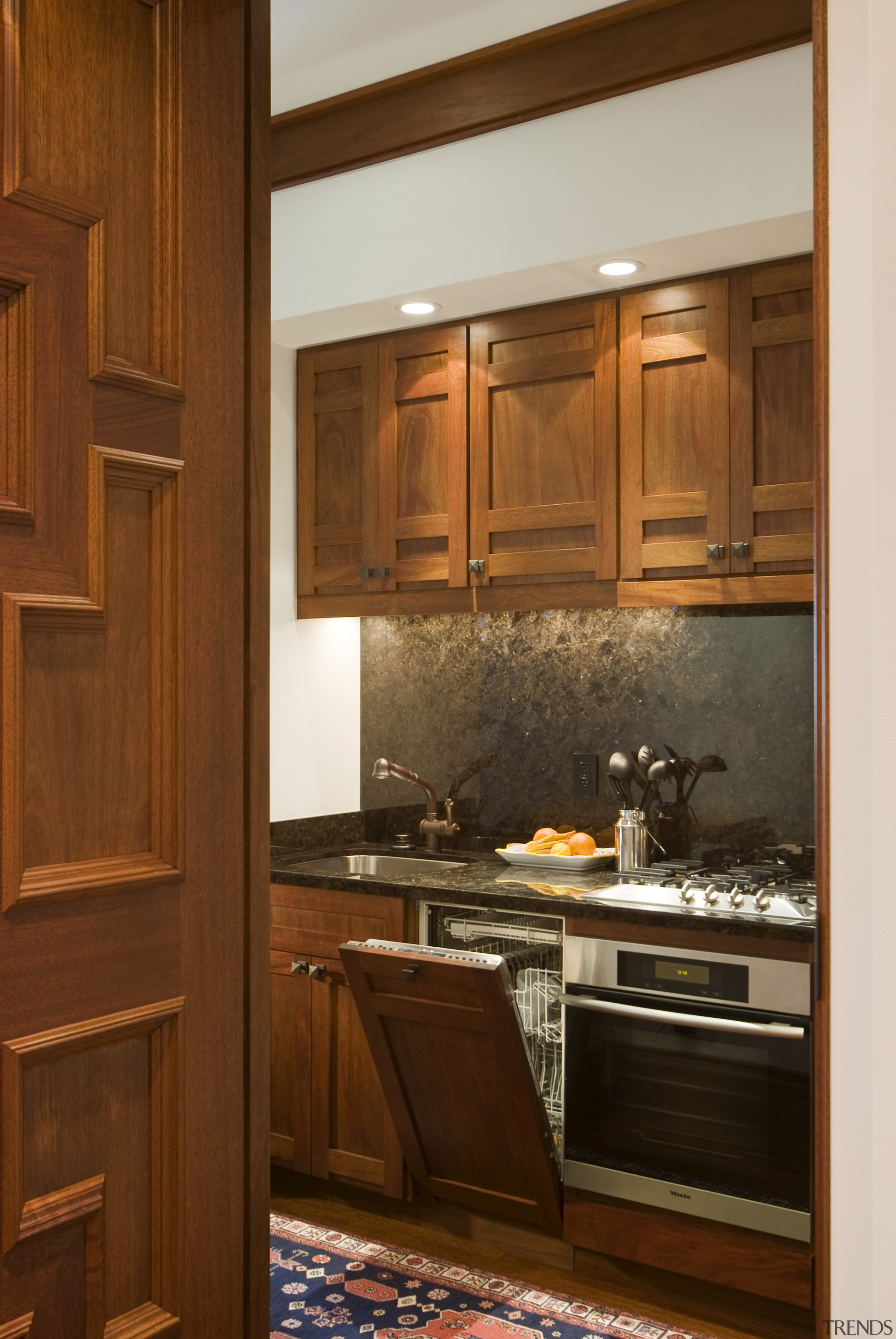 Image of kitchen designed by Standards of Excellence. cabinetry, countertop, cuisine classique, hardwood, home, interior design, kitchen, room, under cabinet lighting, wood, wood stain, brown