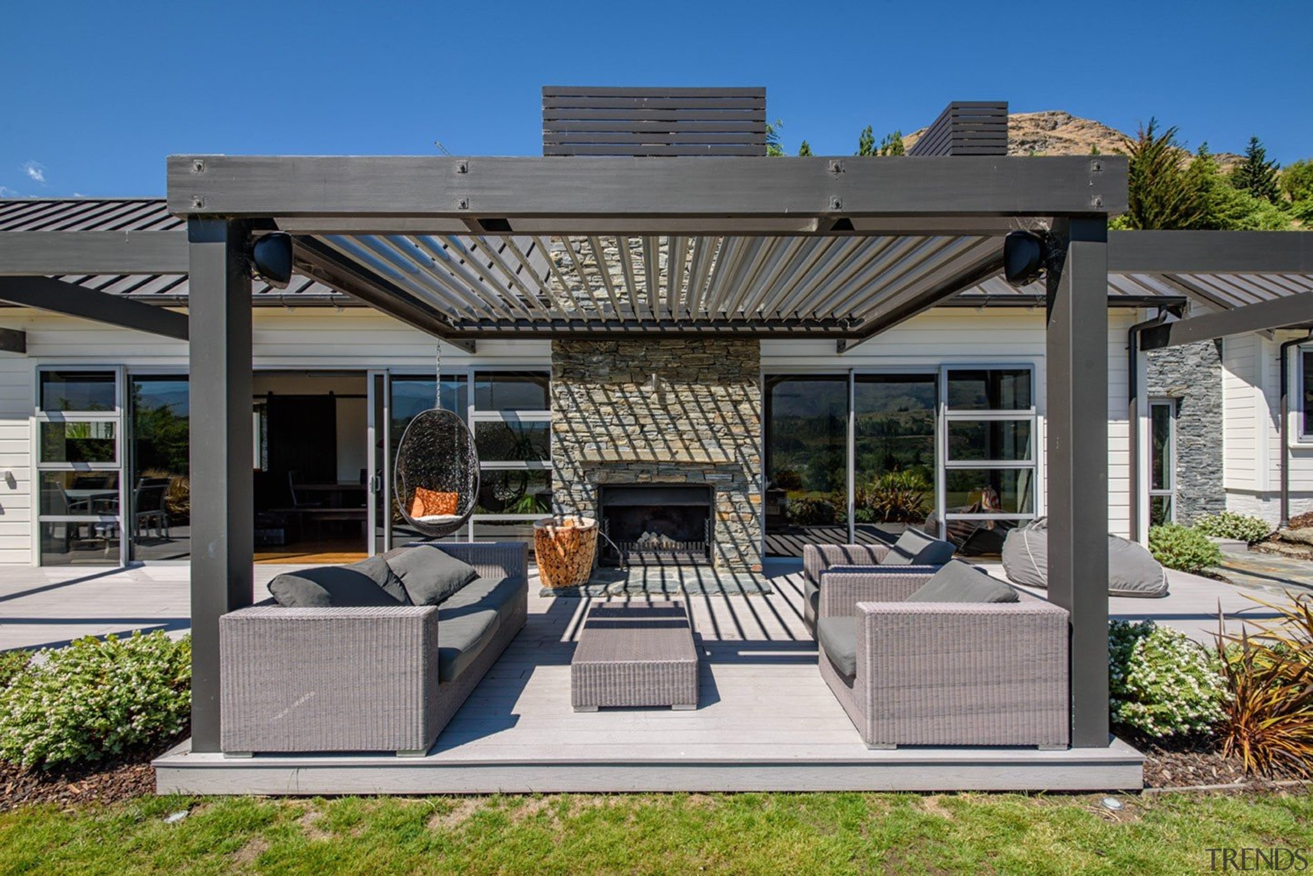 The word ‘relax’ comes to mind with this outdoor structure, real estate, gray