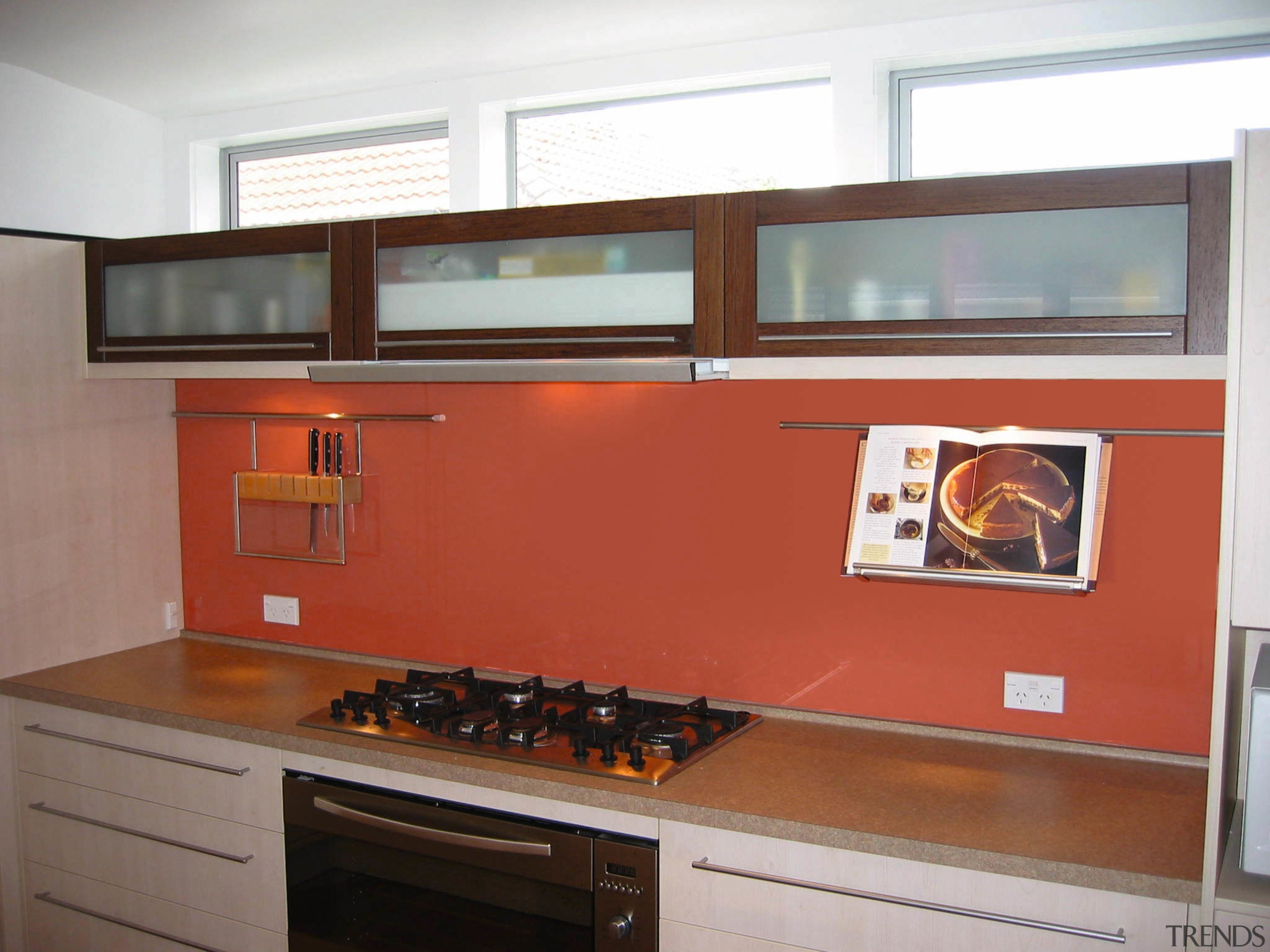 A view of a kitchen, wooden and white cabinetry, countertop, kitchen, room, white