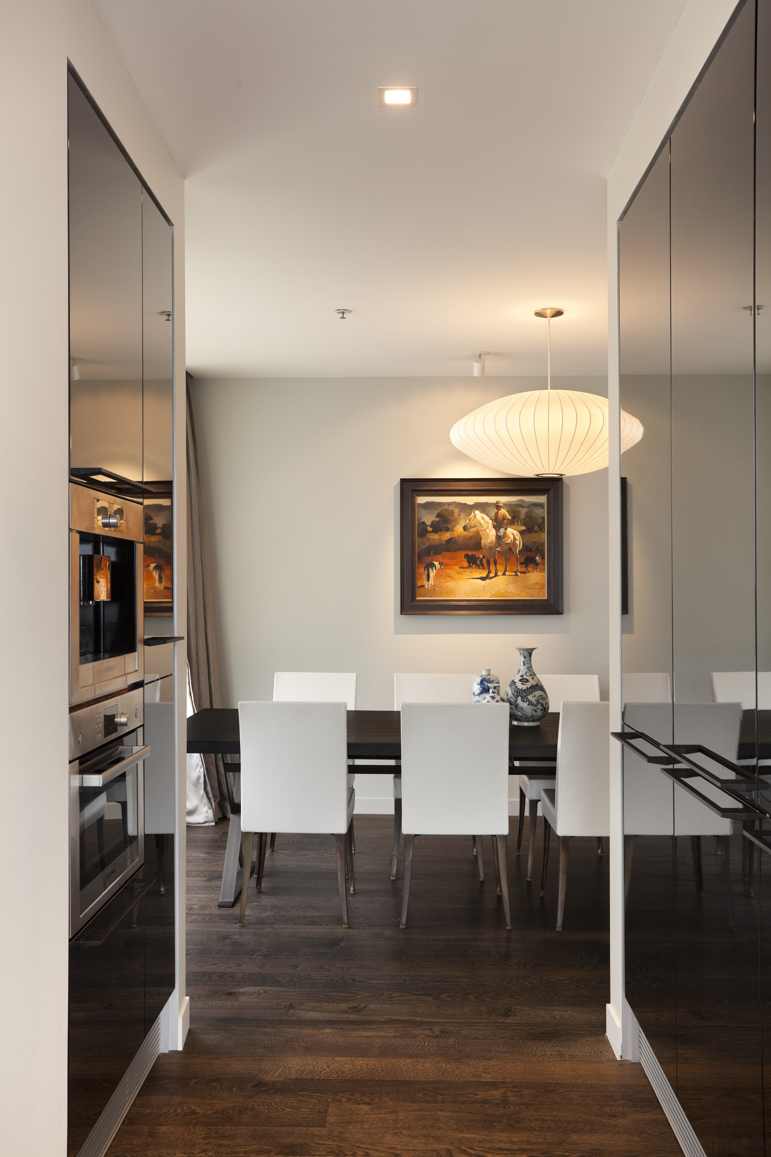 reflective cabinets and built-in wall ovens, white ceilings ceiling, dining room, floor, flooring, furniture, interior design, light fixture, room, table, wood flooring, gray