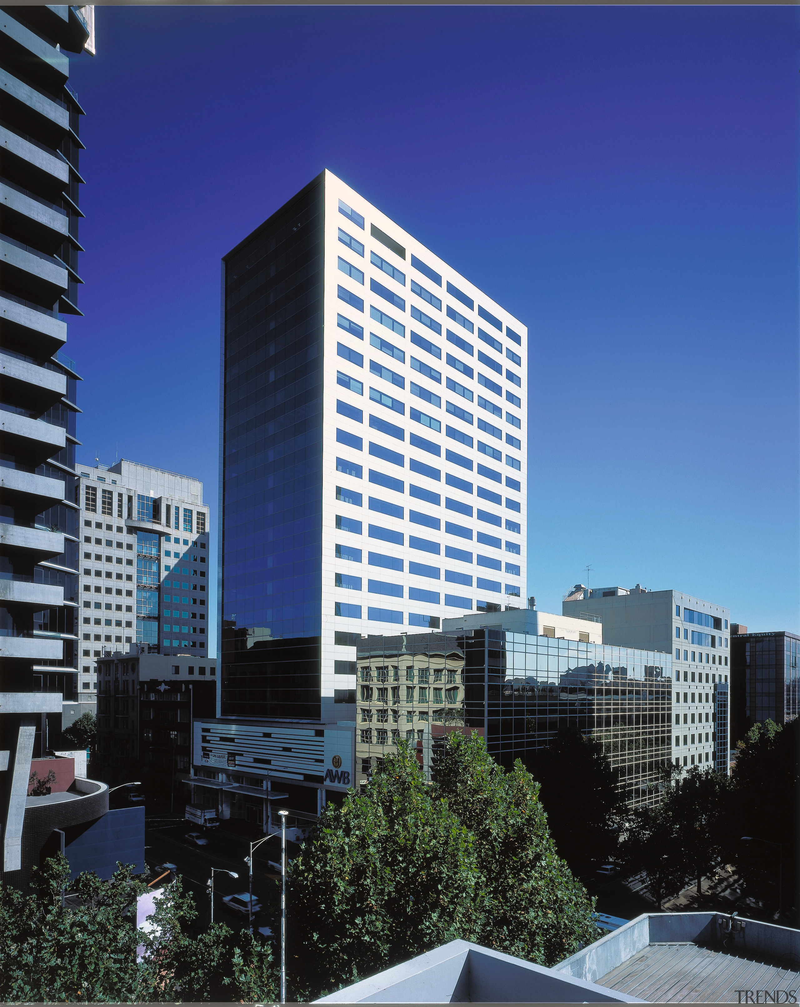 Exterior of highrise tower building with metallic finish architecture, building, city, cityscape, commercial building, condominium, corporate headquarters, daytime, downtown, facade, headquarters, metropolis, metropolitan area, mixed use, real estate, residential area, sky, skyscraper, tower block, urban area, blue, black