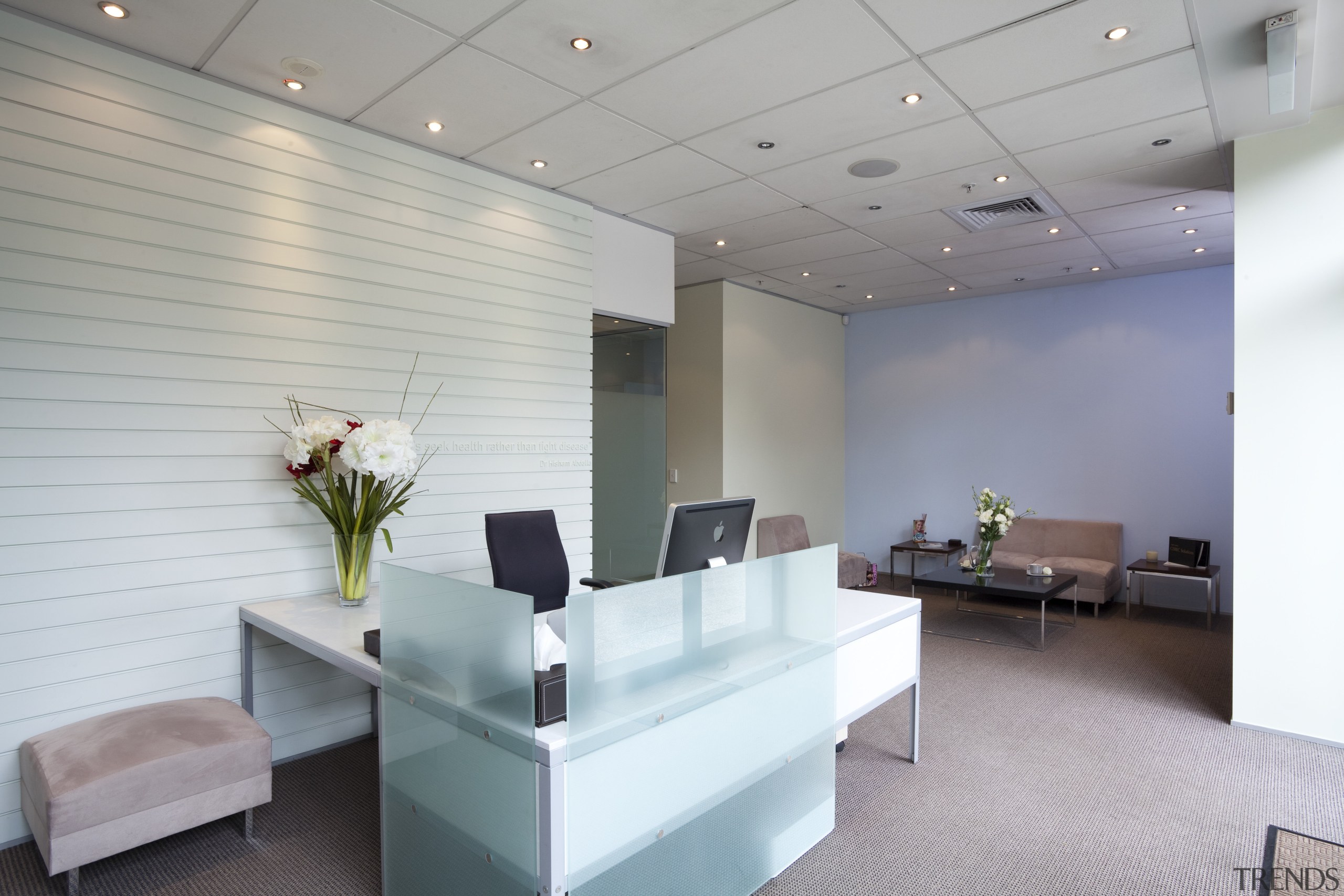 View of recpetion area with vase of flowers. ceiling, conference hall, floor, interior design, lobby, office, real estate, waiting room, gray