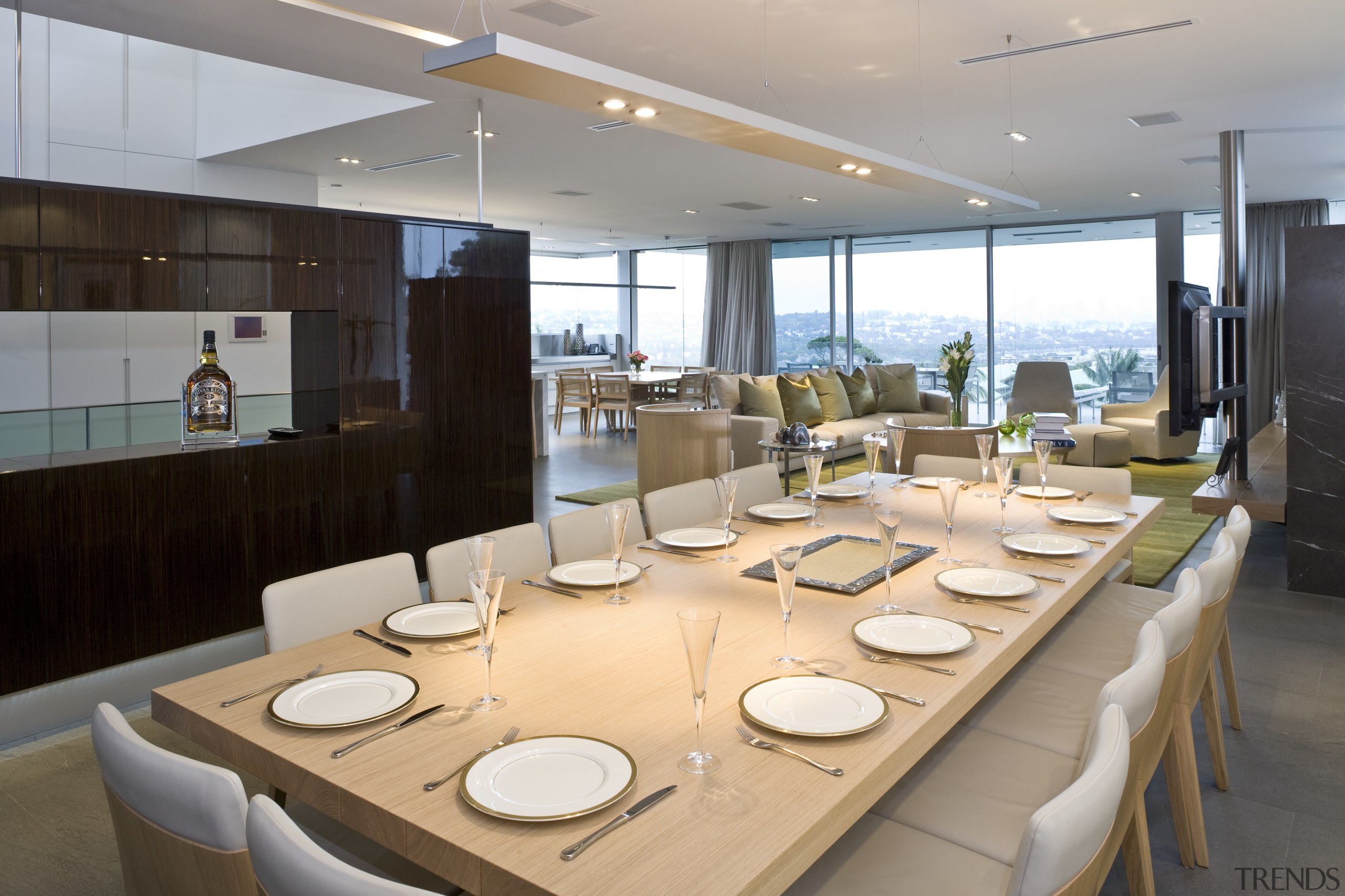 View of the dining area which is separated dining room, interior design, table, gray