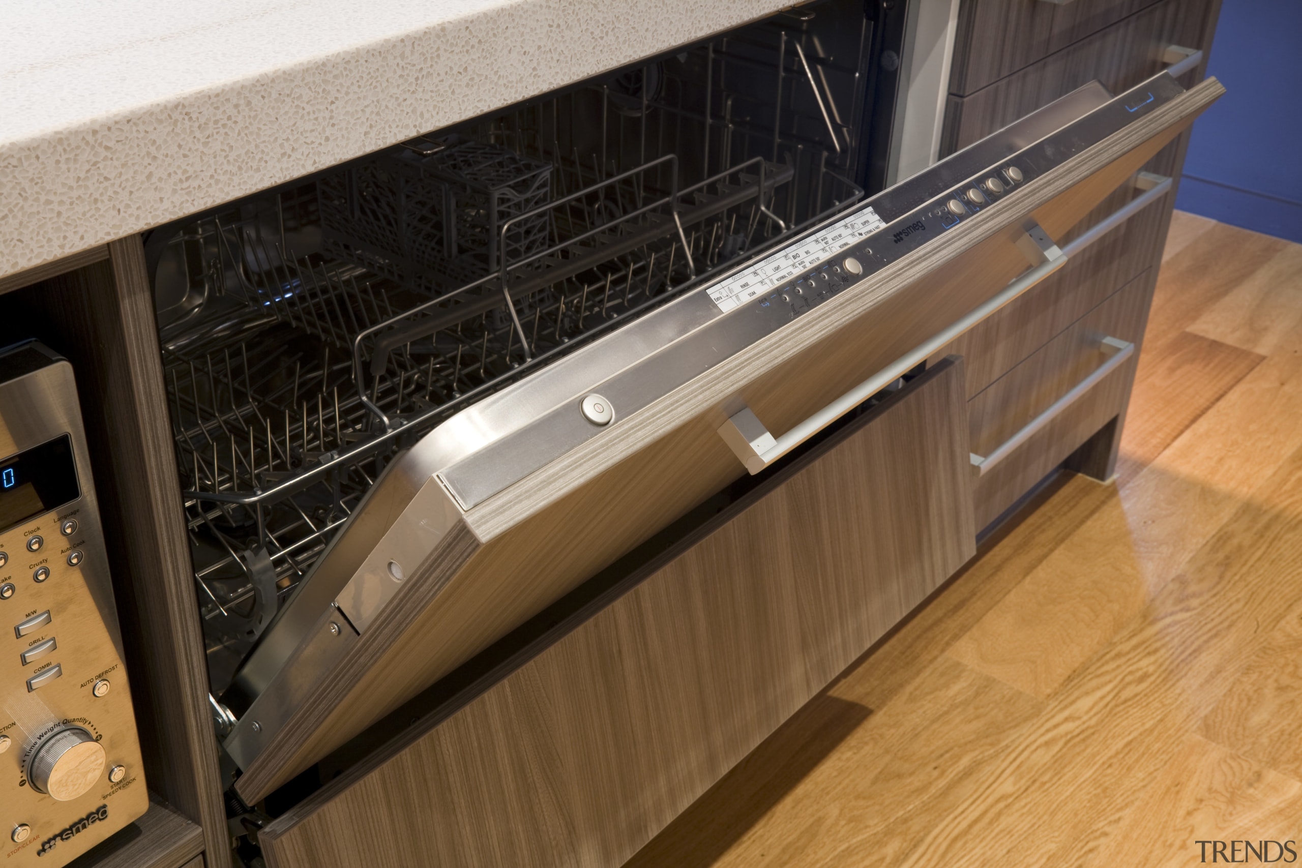 View of the Smeg STH905 dishwasher available from cabinetry, countertop, drawer, floor, flooring, furniture, home appliance, kitchen, kitchen appliance, major appliance, wood, brown, black